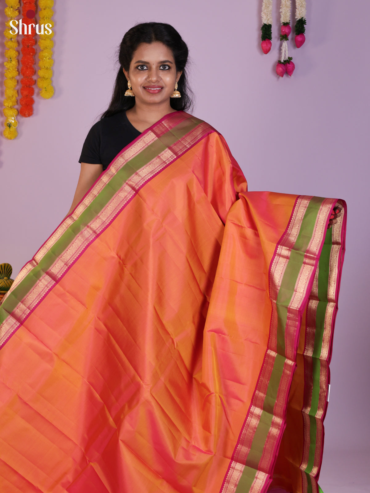 Lustrous Orange Kanjivaram Pattu Saree With Pink Rettaipet Zari Border