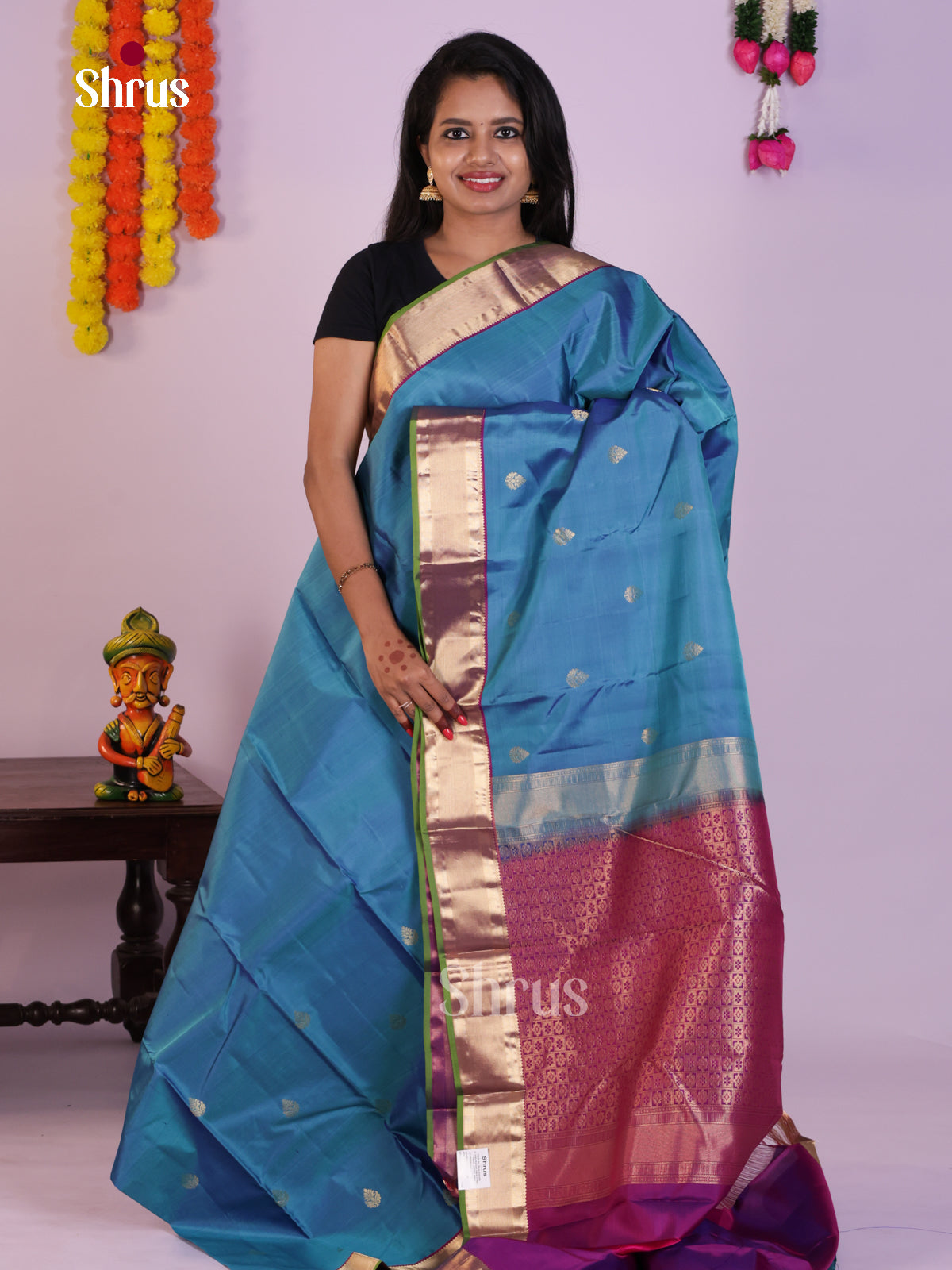 Enchanting Sky Blue Kanjivaram Saree With Golden Leaf Motifs & Magenta Brocade Pallu