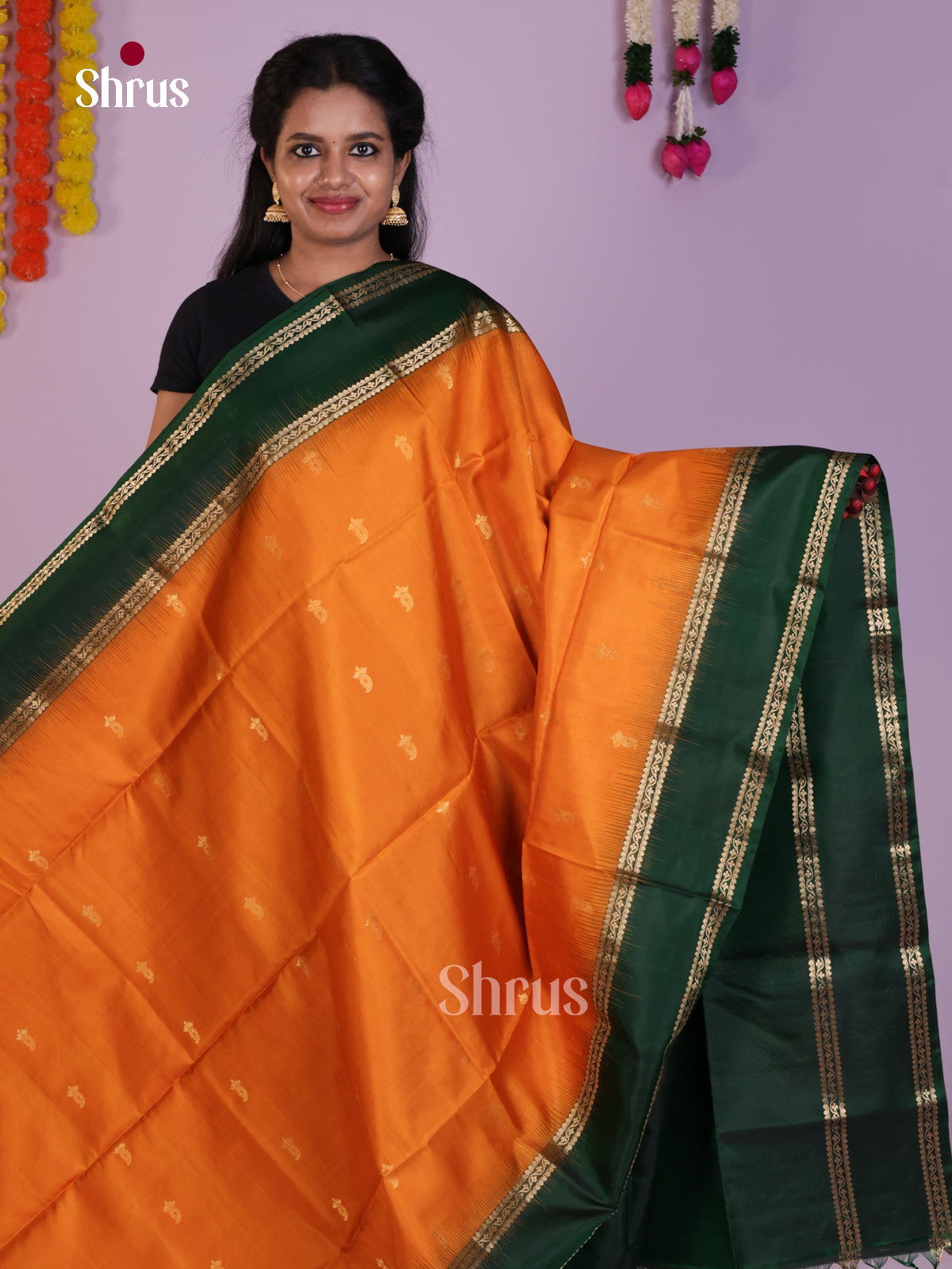Radiant Orange & Green Soft Silk Saree with zari buttas & Rettaipet border