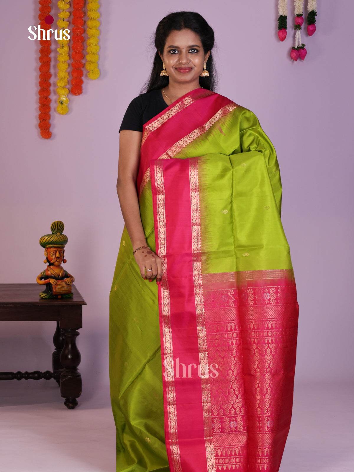 Dazzling Light Green & Pink Soft Silk Saree with zari buttas & Rettaipet border