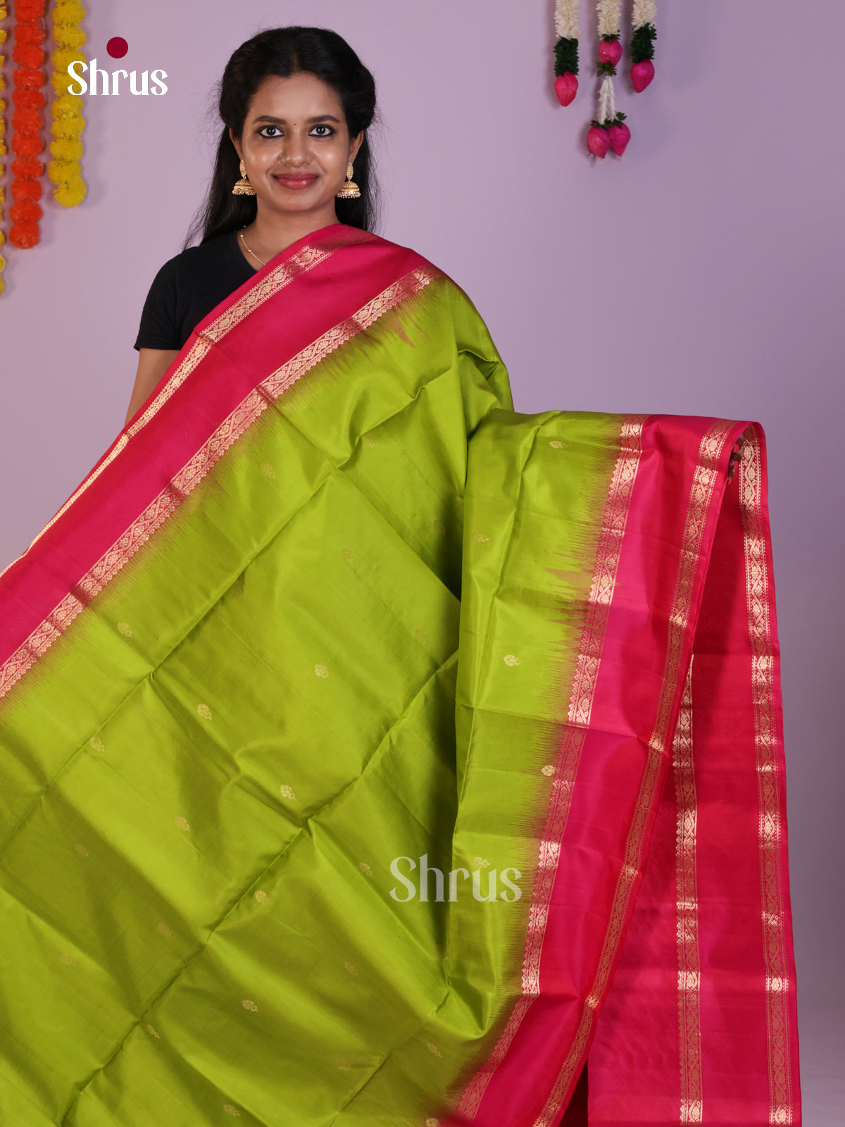 Dazzling Light Green & Pink Soft Silk Saree with zari buttas & Rettaipet border