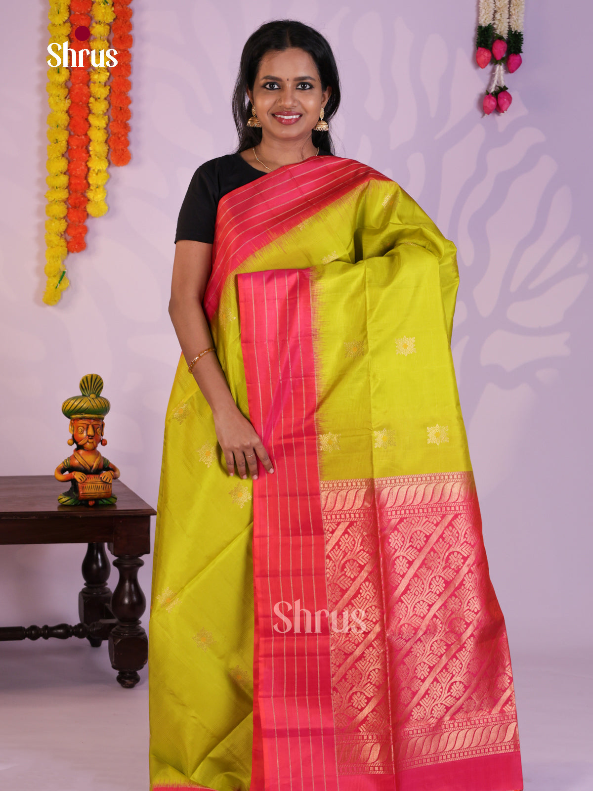 Charming Light Green & Orangish Pink Soft Silk Saree with zari floral buttas