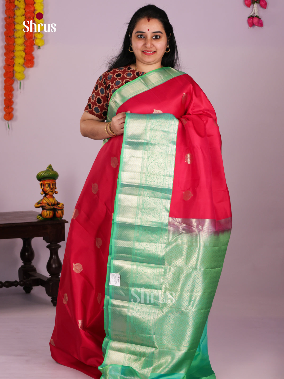 Lustrous Crimson Red Kanjivaram Saree With Sea Green Zari Border