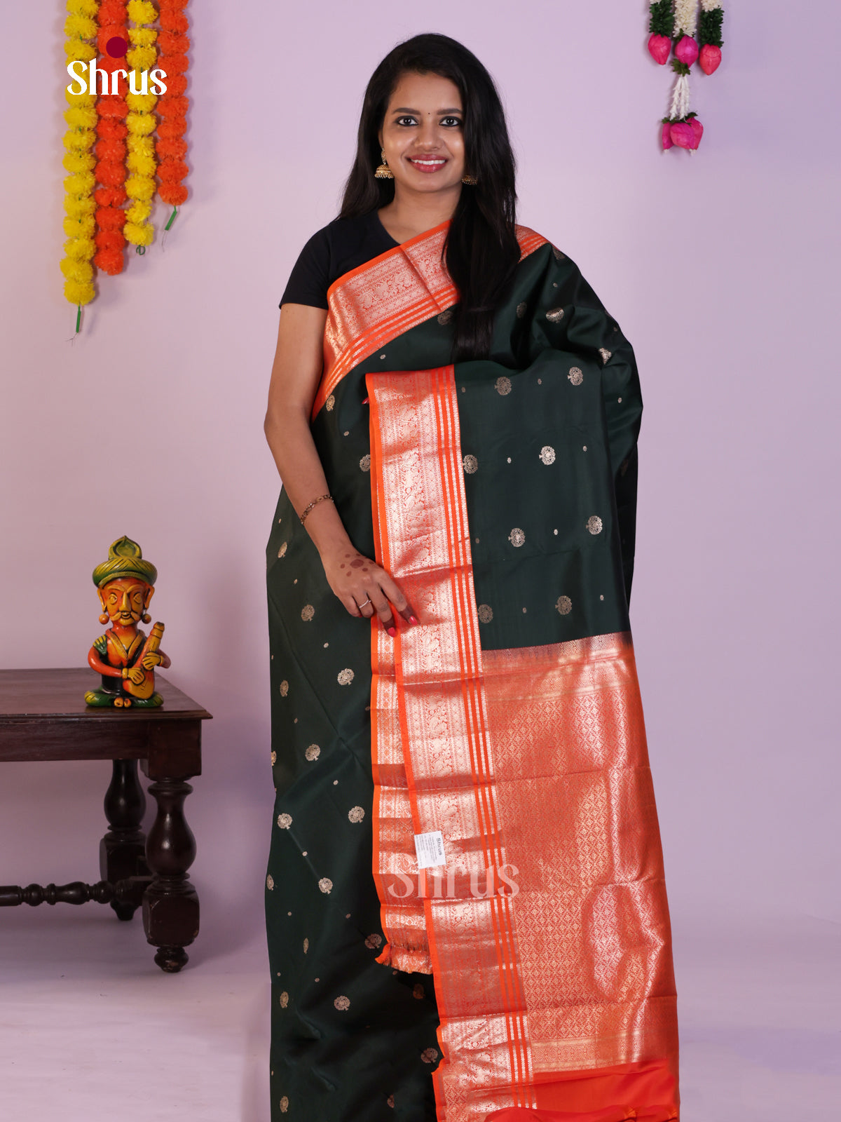 Classy Dark Green Pattu Saree With Circular Buttas & Orange Brocade Pallu