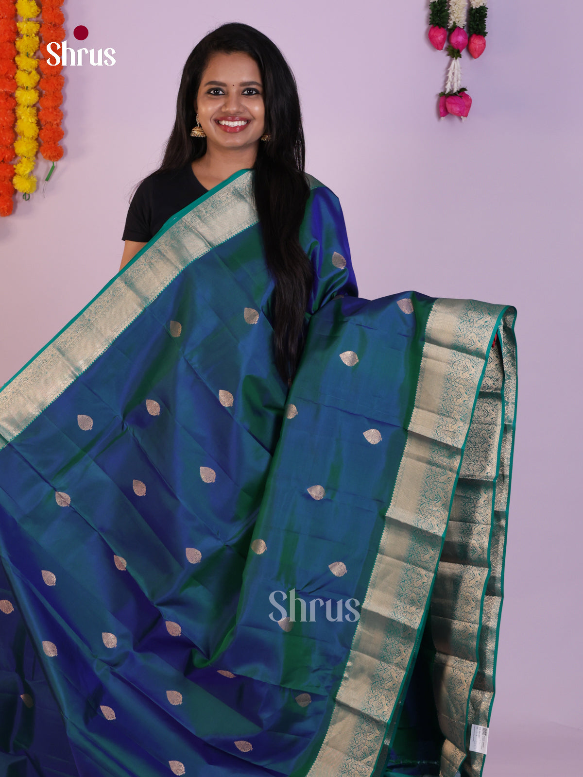 Elegant Royal Blue Kanjivaram Saree With Floral Motifs & Teal Blue Pallu