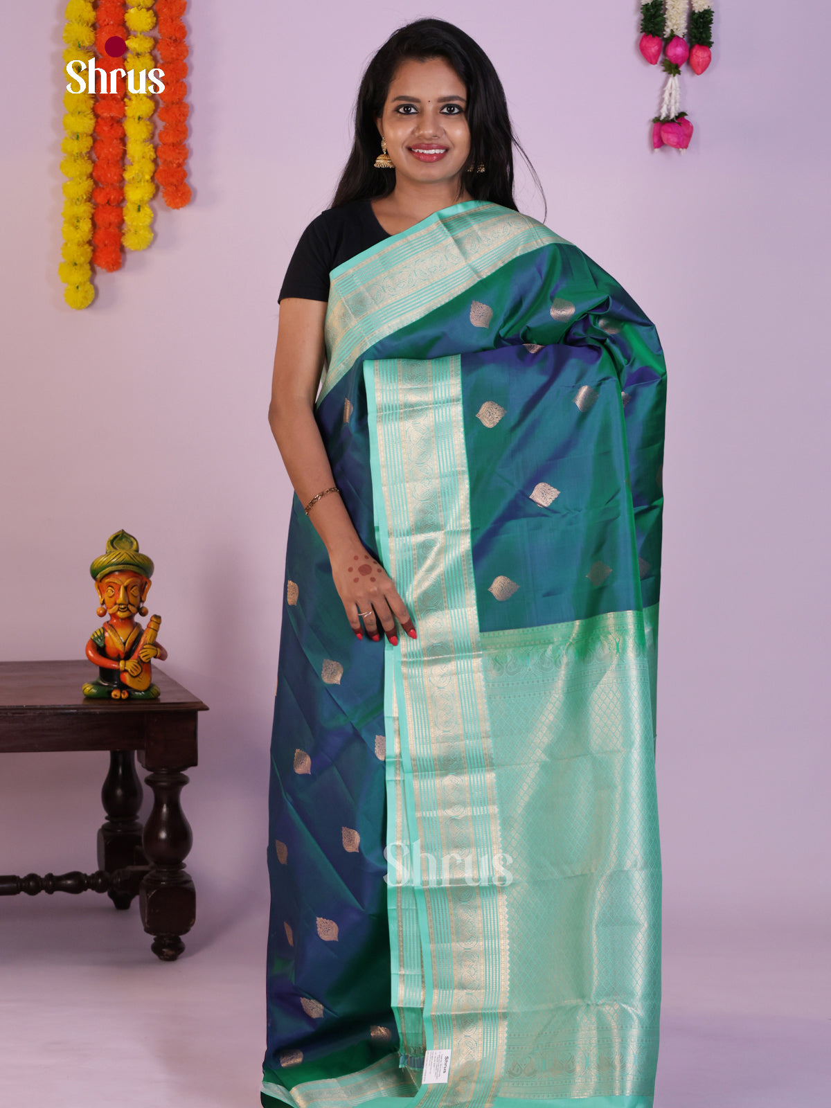 Elegant Navy Blue Kanchipuram Saree With Leaf Motifs & Aqua Blue Zari Border