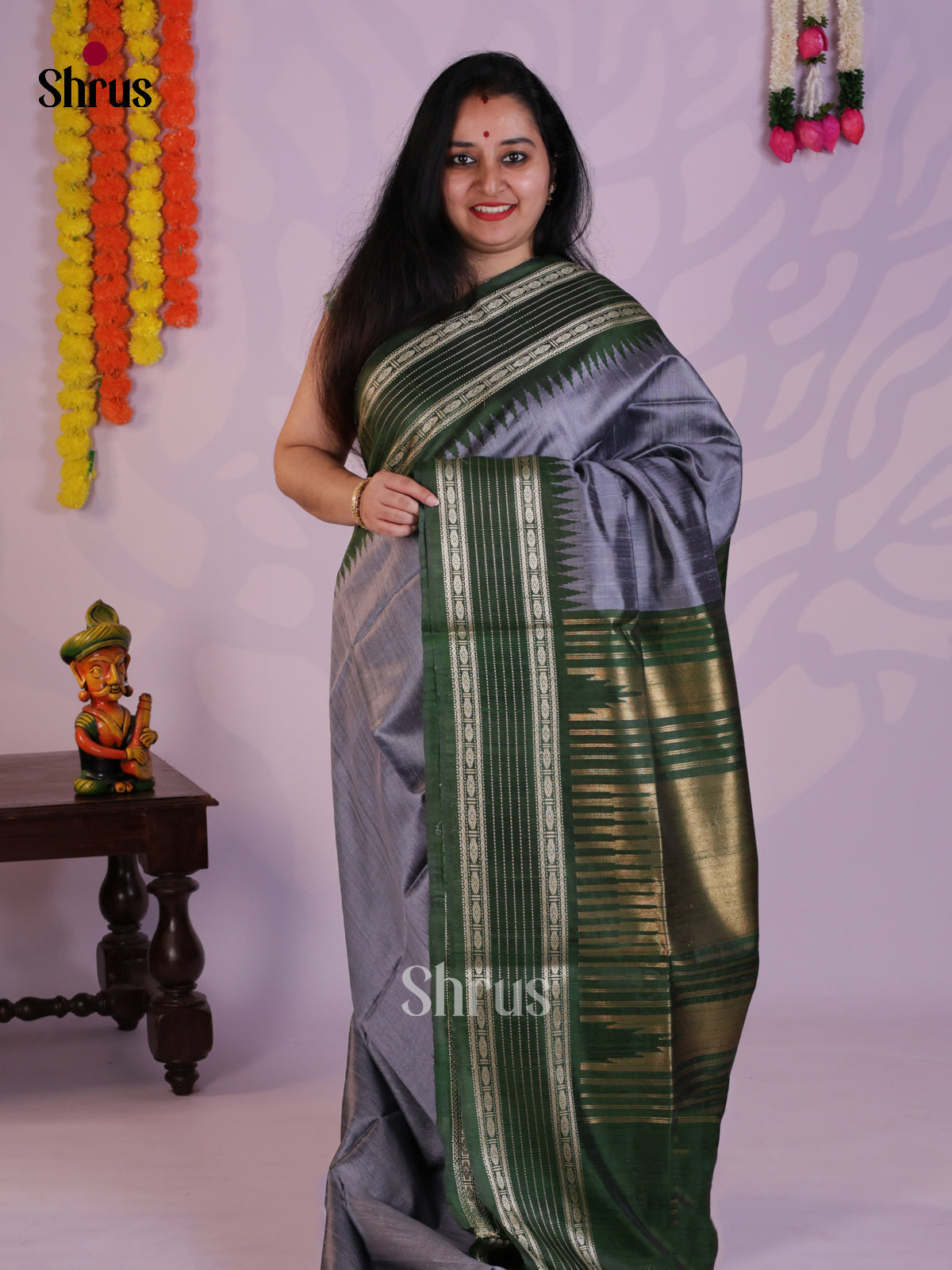 Beautiful Grey & Green Raw Silk Saree with contrast zari border - DLS30034