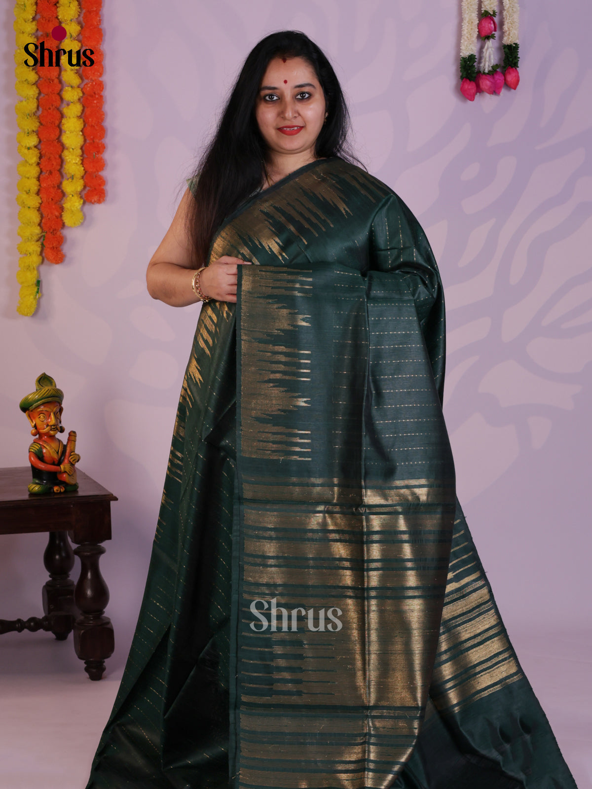 Classy Green Single tone  Raw Silk Saree with zari stripes & temple border -DLS30062
