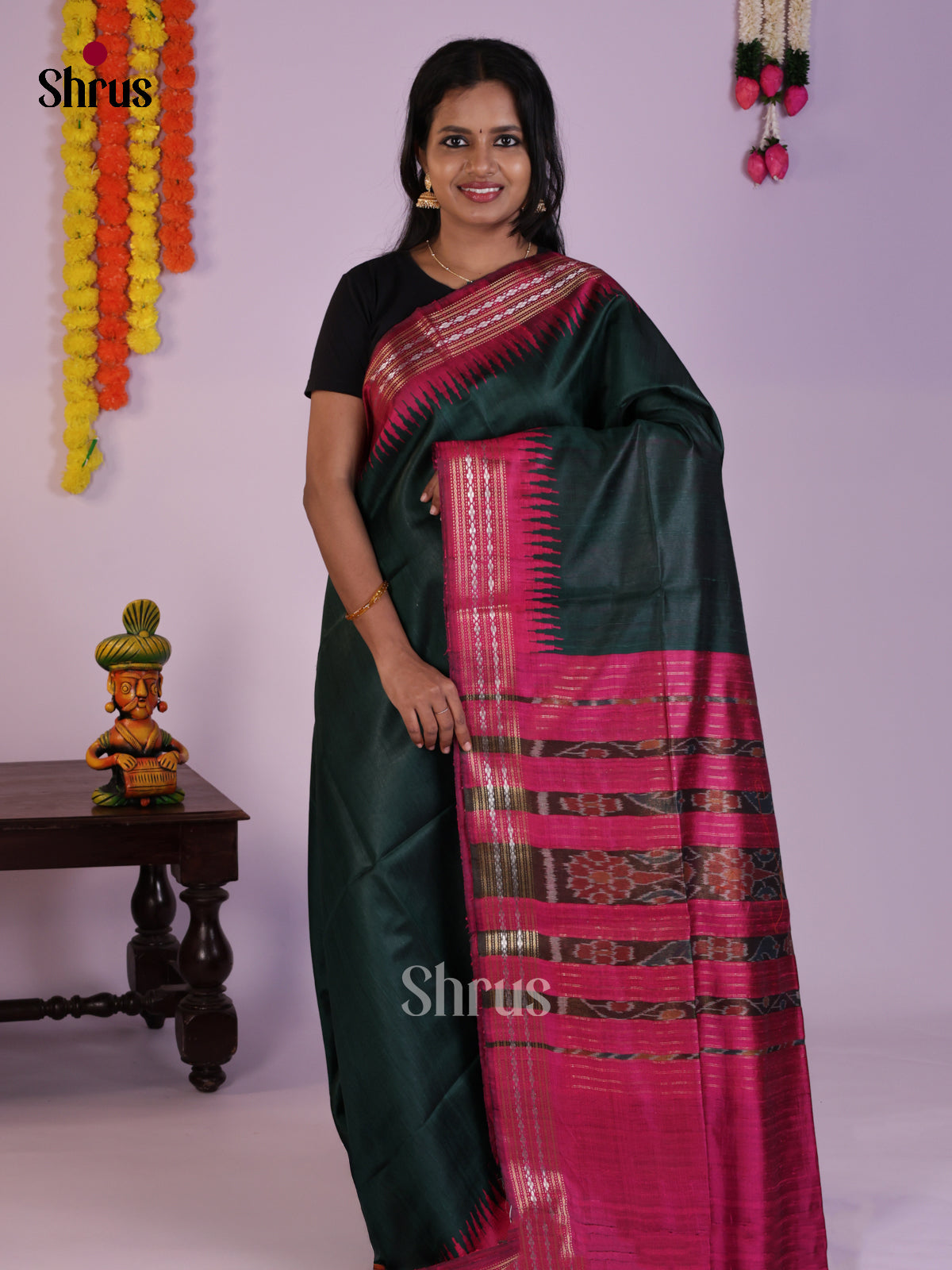Luxurious Dark Green Raw Silk Saree with temple contrast zari border- DLS30086