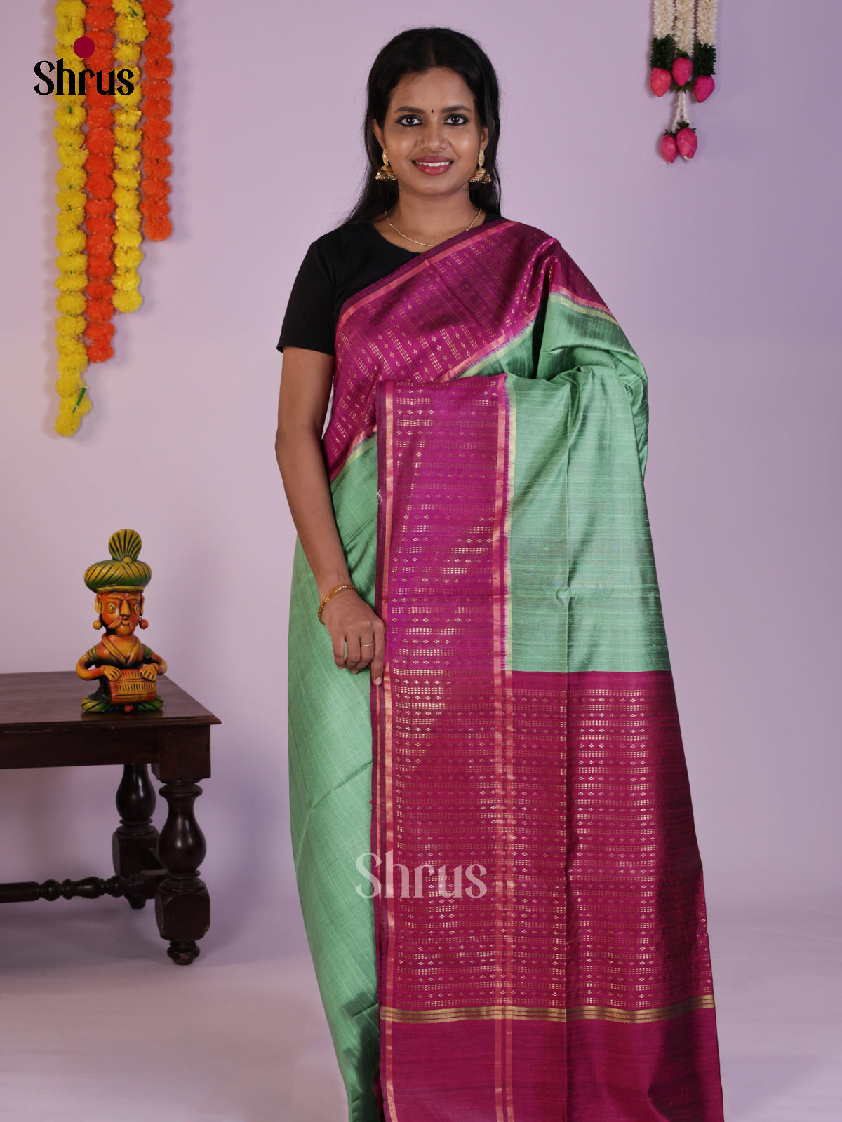 Serene Sea Green & Majenta Raw Silk Saree with contrast zari border - DLS30161