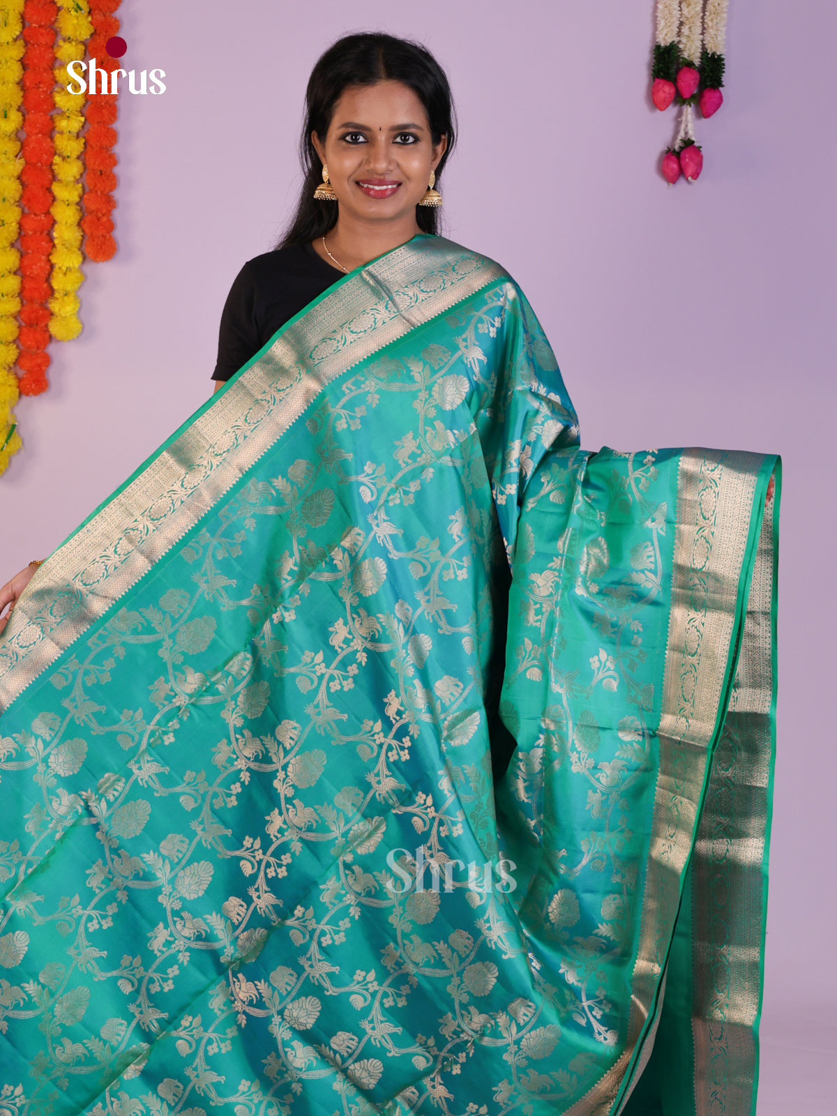 Radiant Teal Soft Silk Saree  with zari vanashingaram floral nestling brocade