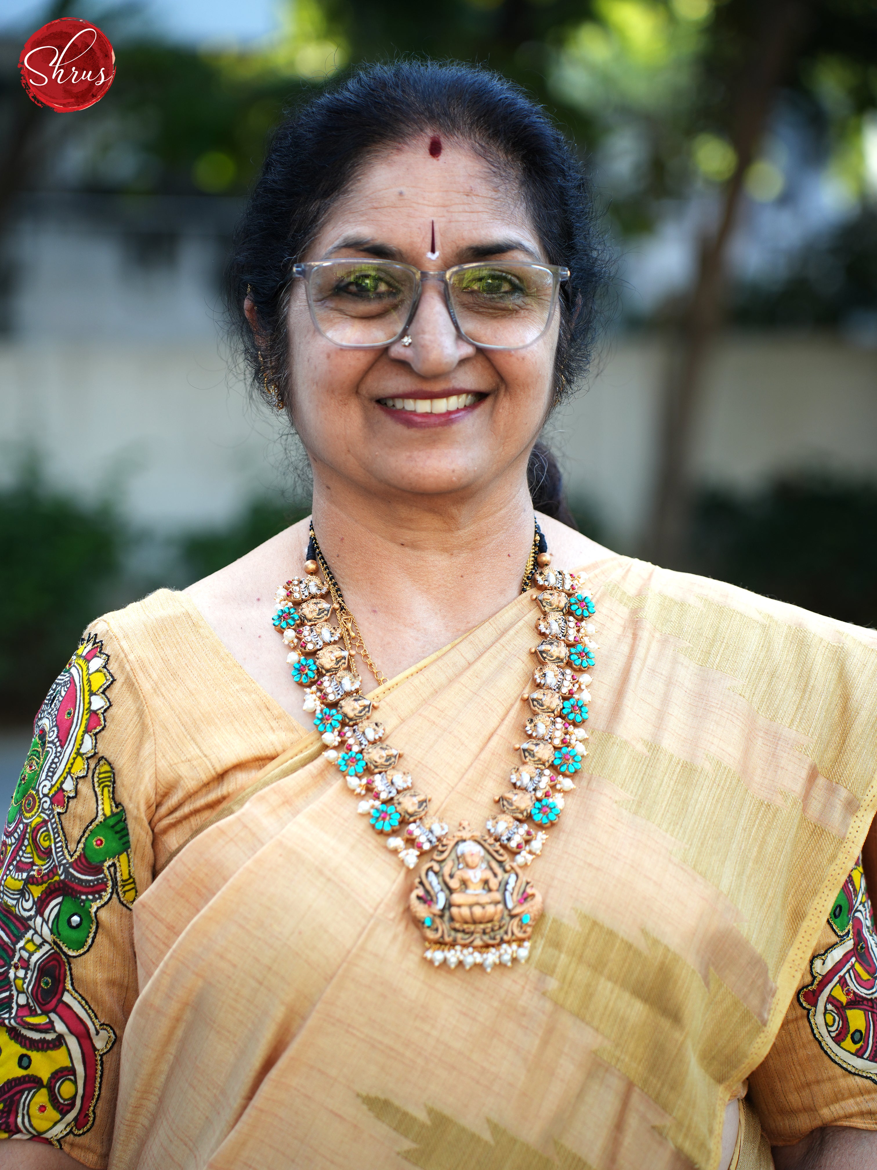 Handcrafted Lakshmi pendant terracotta jewellery with jhumkas Accesso
