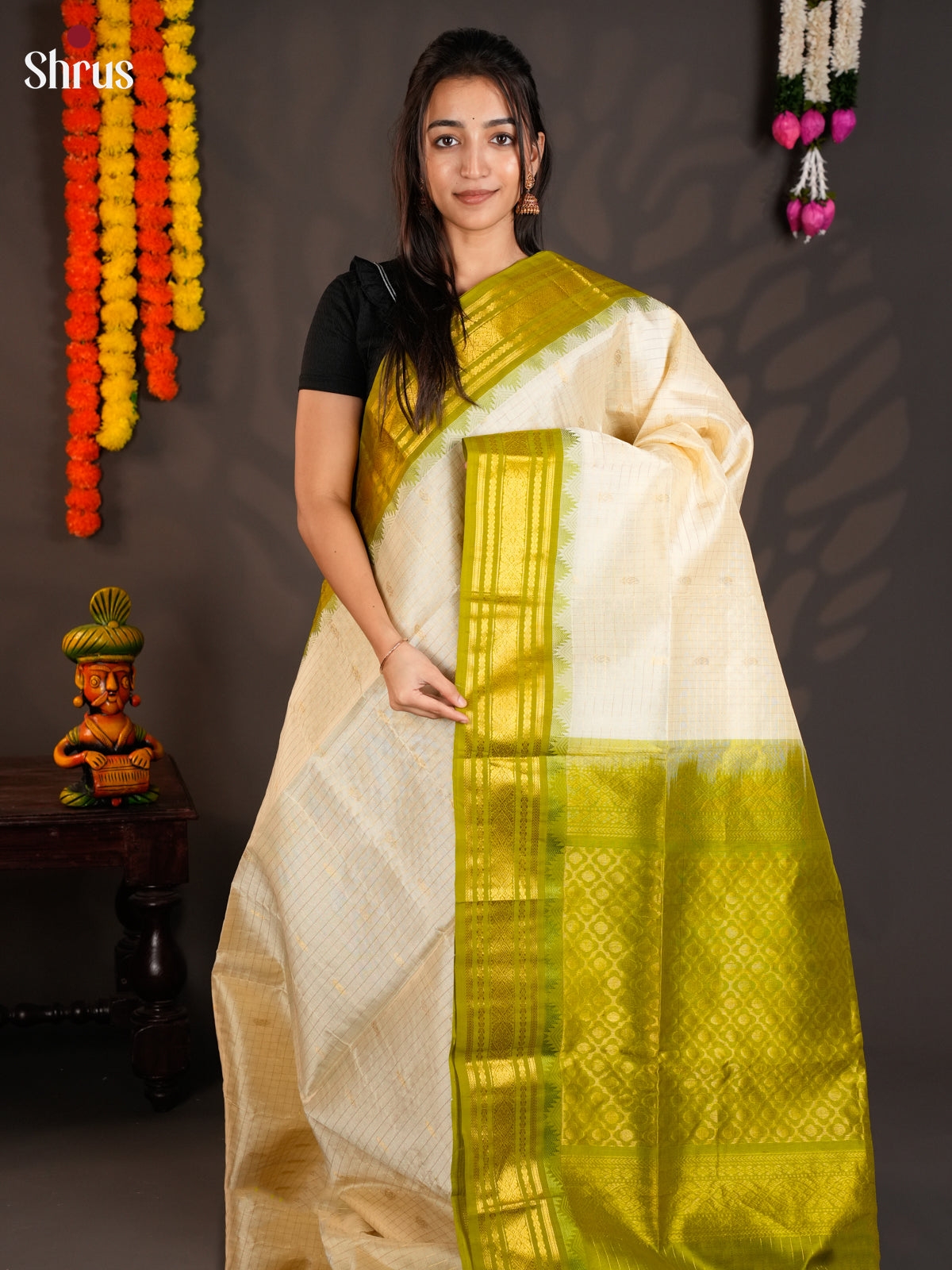 Charming Cream & Green Silk Cotton Saree with zari checks & korvai border -EAS19039