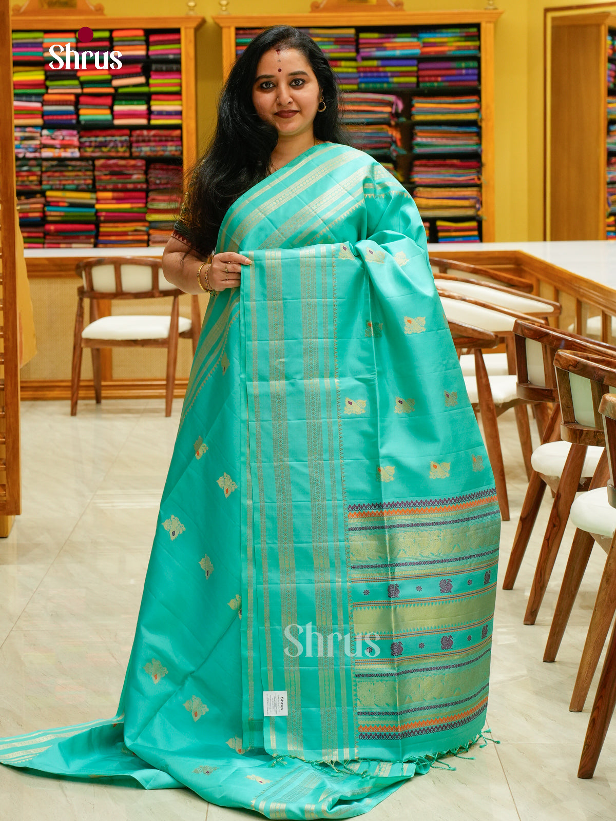 Teal Blue Soft Silk Saree with Peacock Buttas