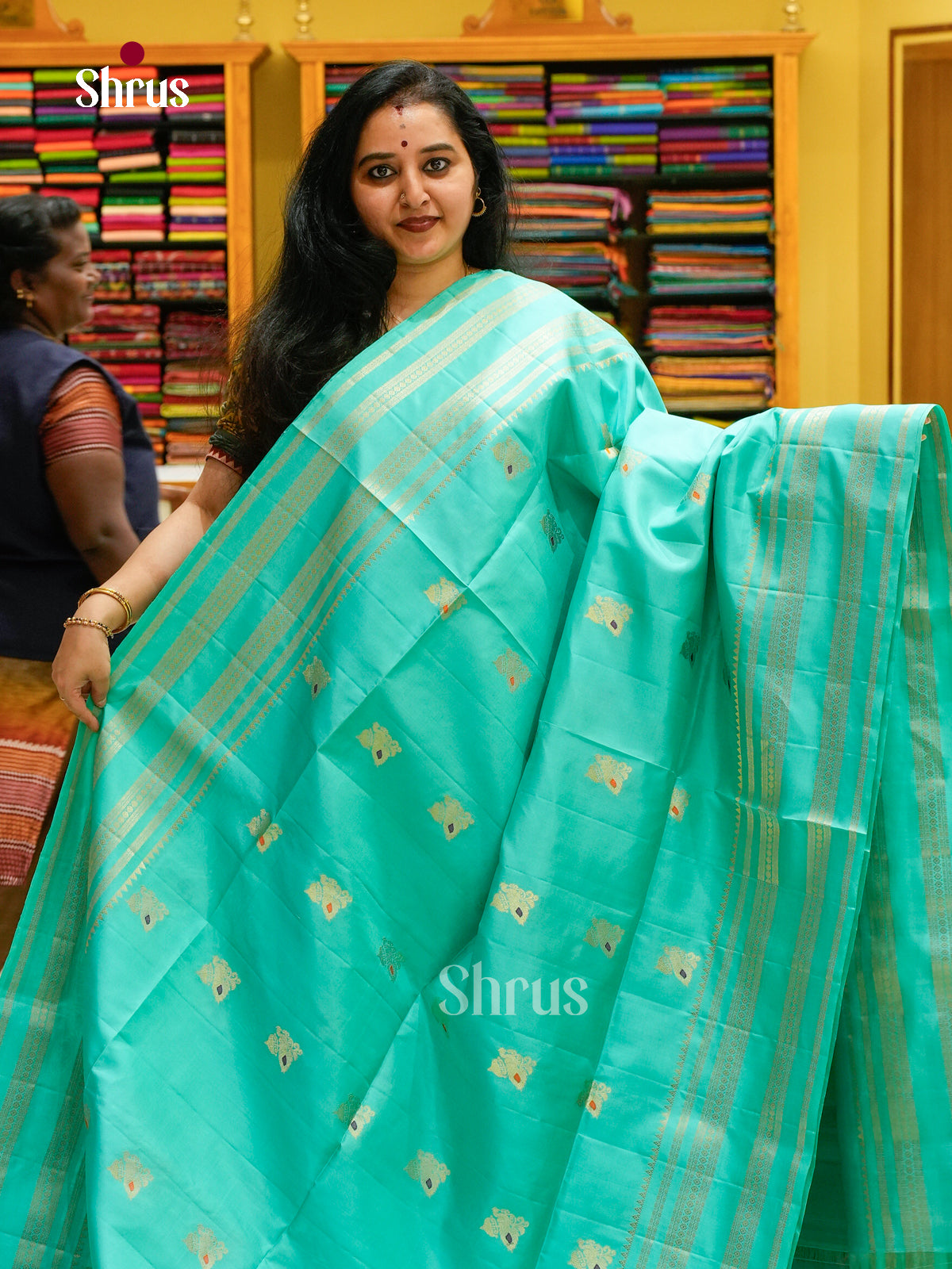 Teal Blue Soft Silk Saree with Peacock Buttas