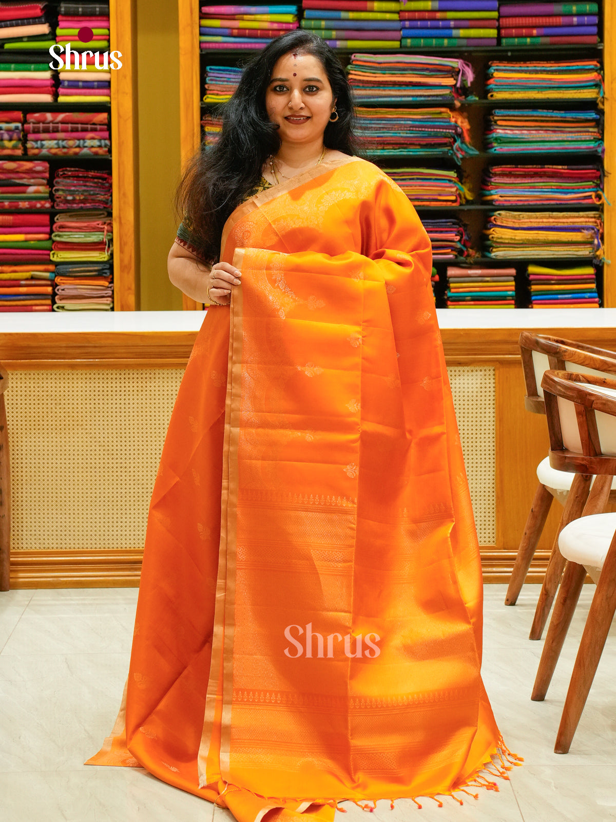 Orange Soft Silk Saree with Floral Buttas