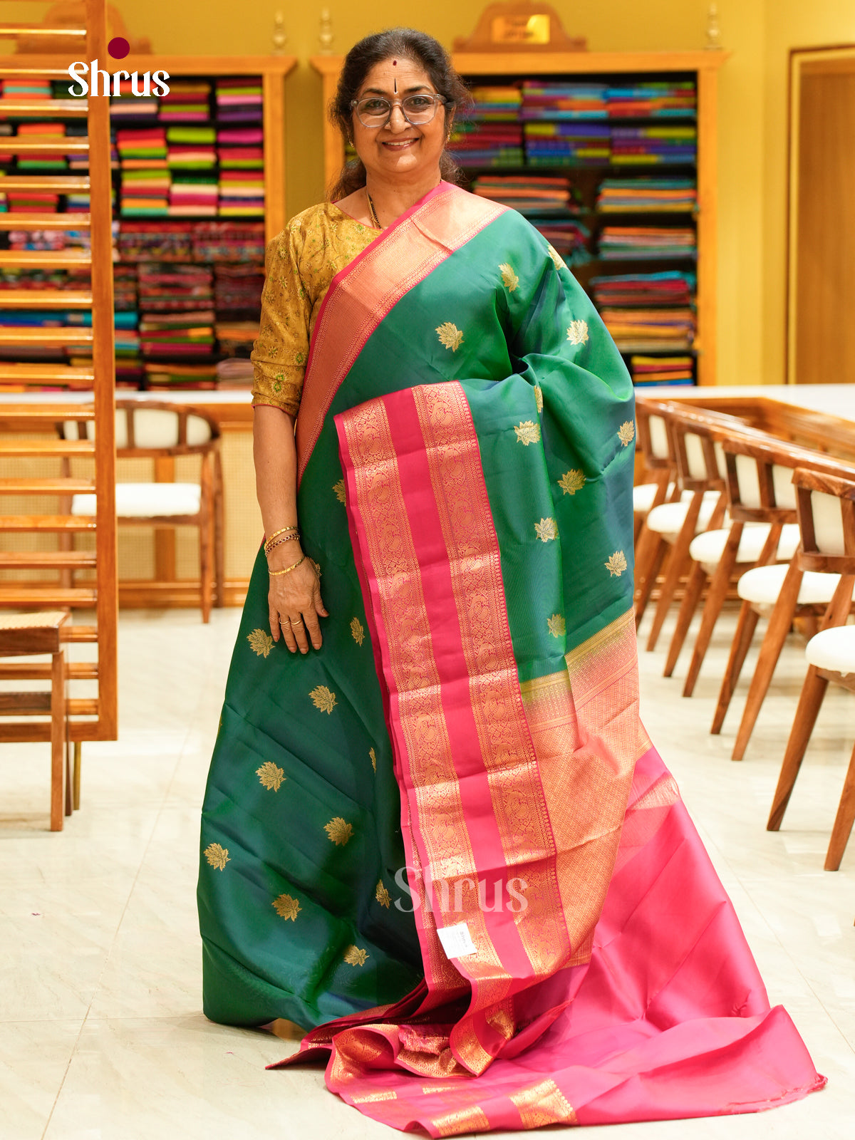 Green Kanchipuram Silk Saree with Floral Buttas | Pink Contrast Border — EFS27292