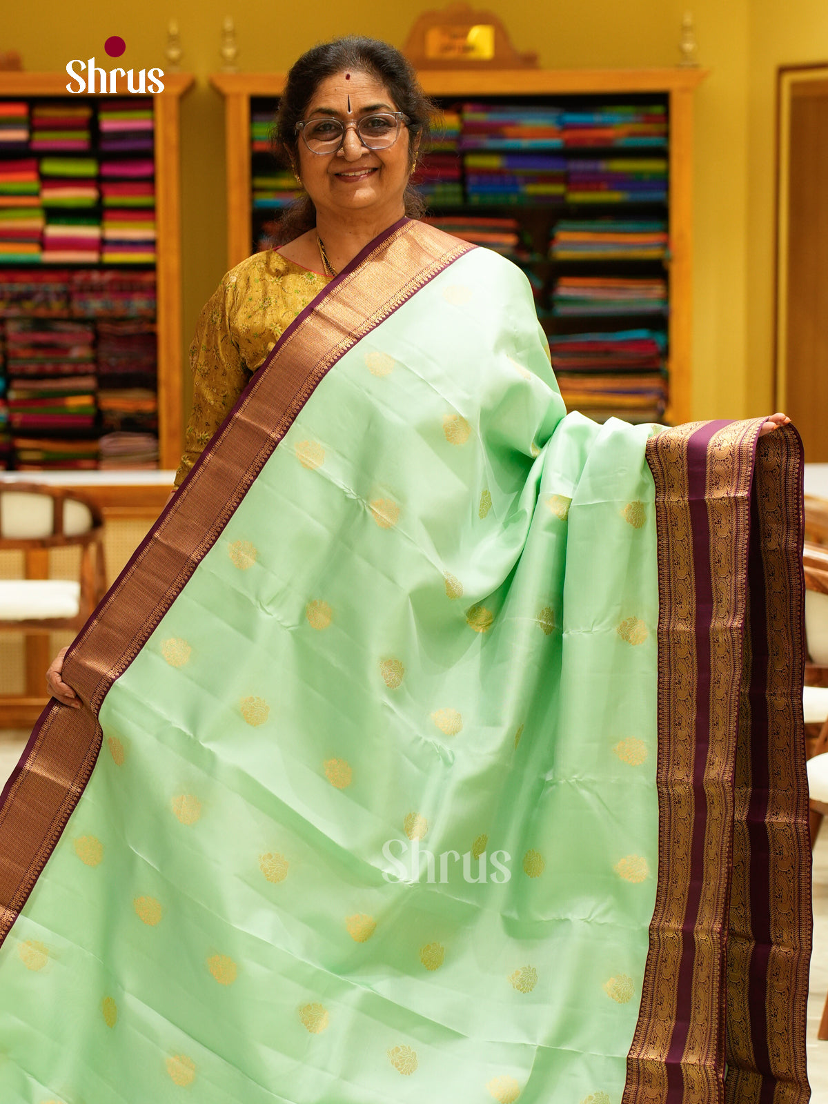 Sea Green Kanchipuram Silk Saree with Floral Buttas | Wine Contrast Border - Shop on Shrus.com
