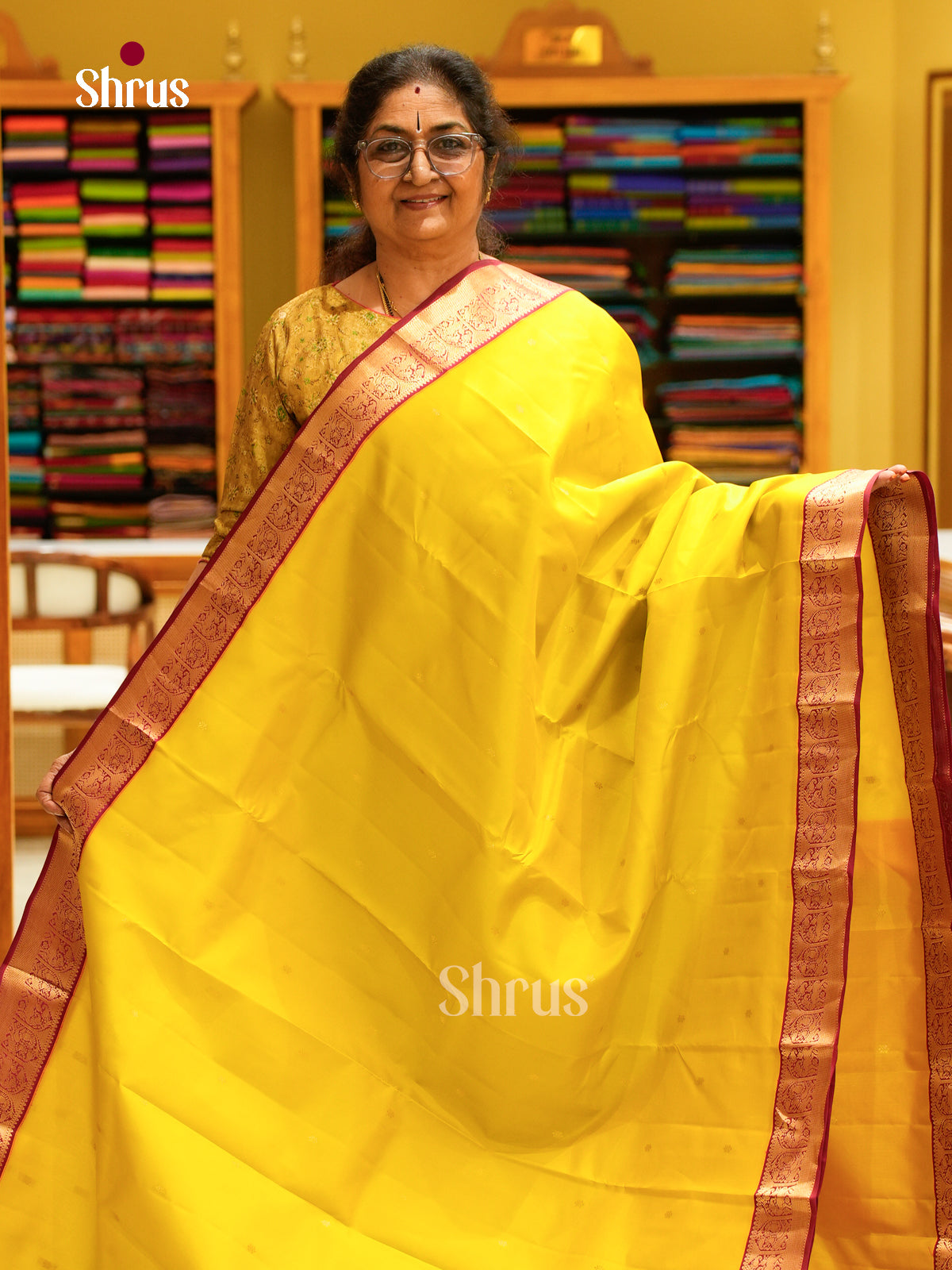 Yellow Kanchipuram Silk Saree with Floral Buttas | Maroon Contrast Border — EFS27295