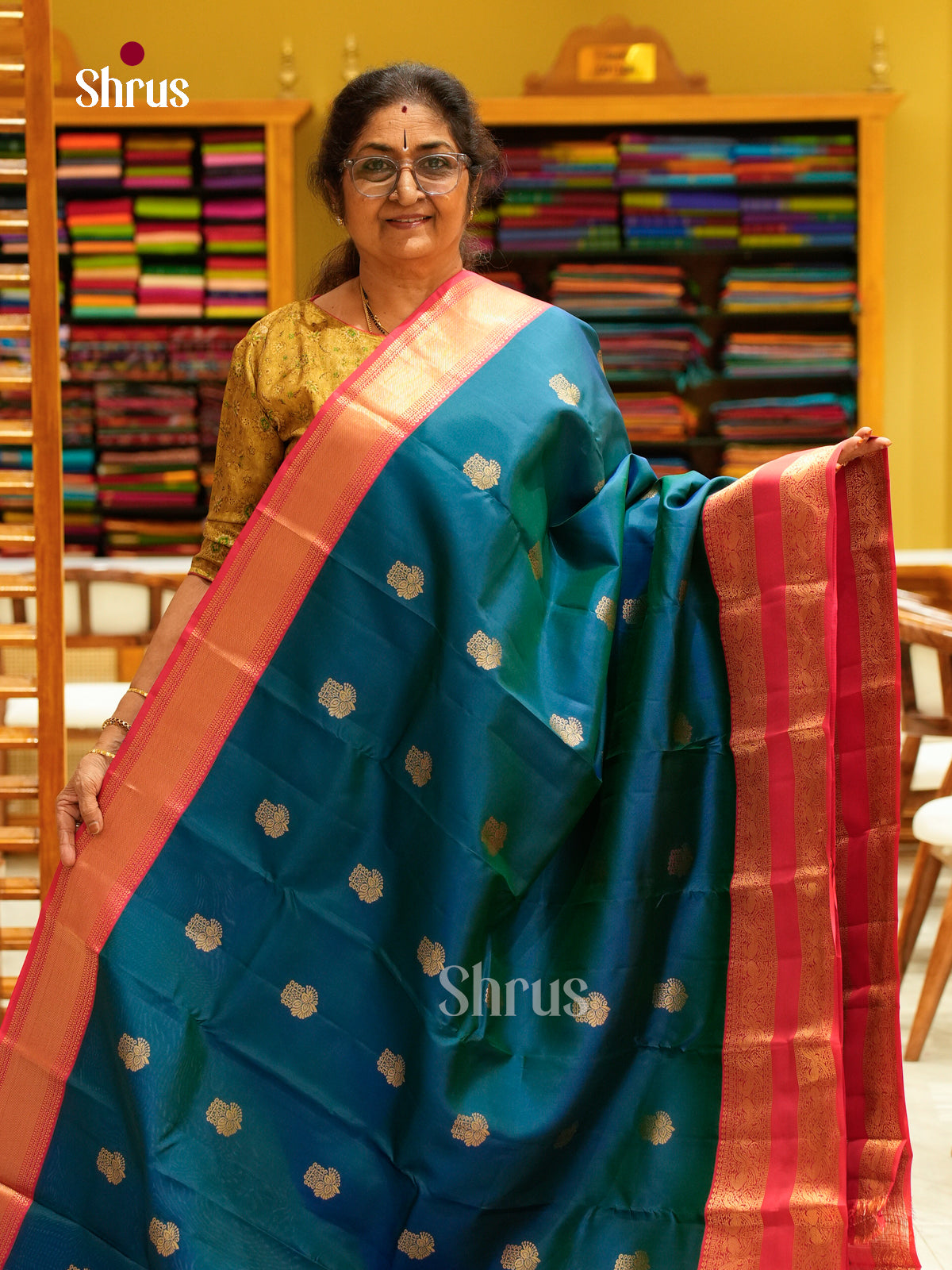 Peacock Green Kanchipuram Silk Saree with Floral Buttas | Pink Contrast Border - Shop on Shrus.com
