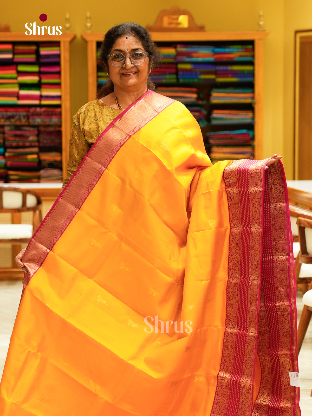 Yellow Kanchipuram Silk Saree with Floral Buttas | Pink Contrast Border — EFS27305 - Shop on Shrus.com