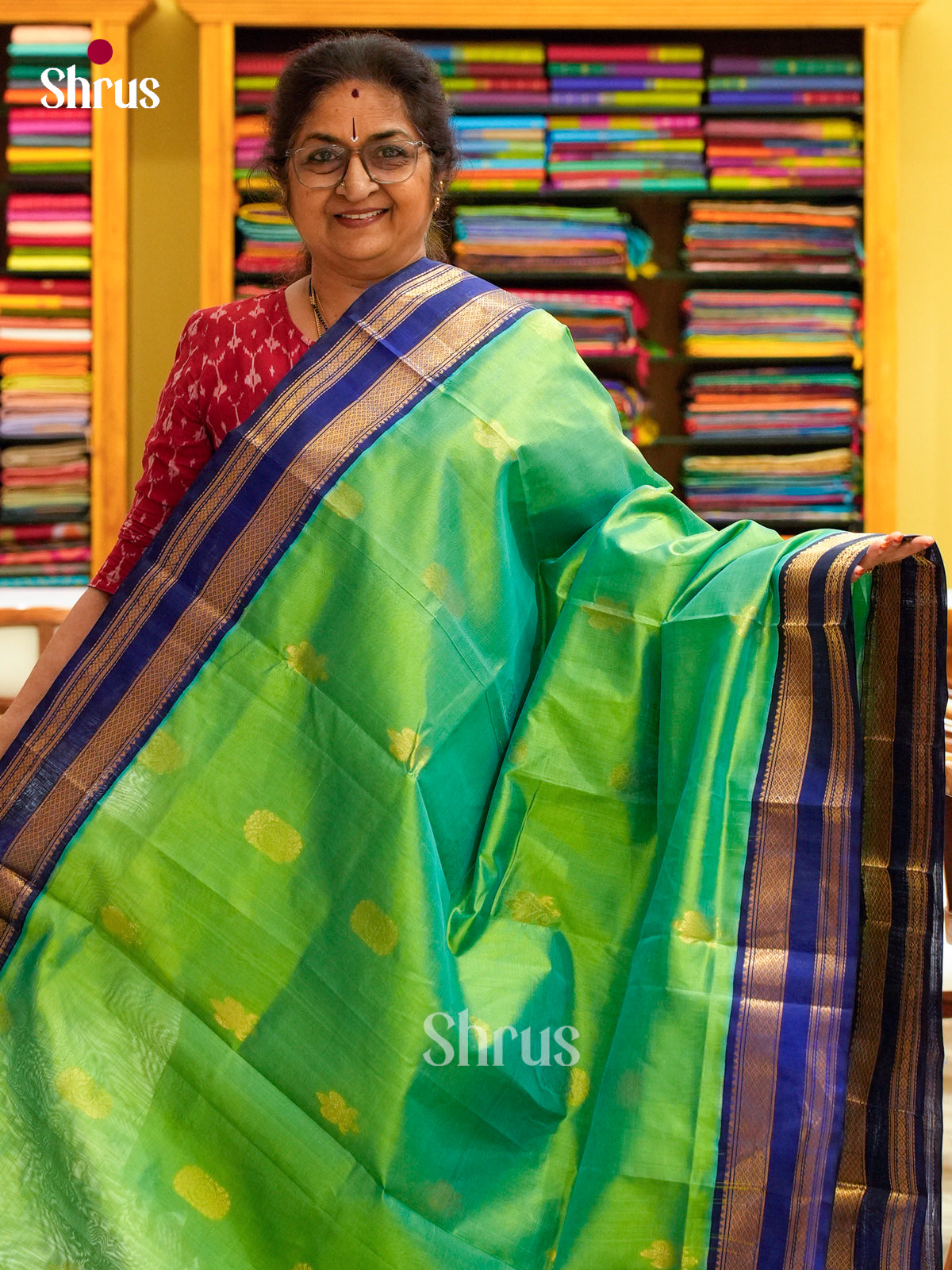 Green Halfpure Silk Cotton Saree with Floral Buttas | Blue Contrast Border