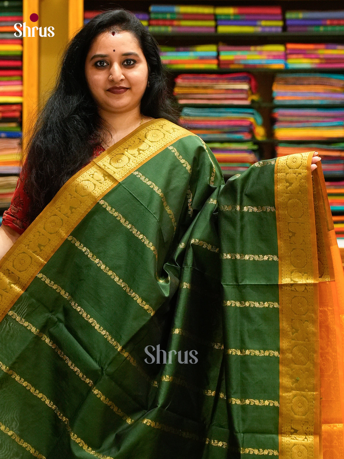 Dark Green Halfpure Silk Cotton Saree with Floral Buttas | Orange Contrast Border - Shop on Shrus.com