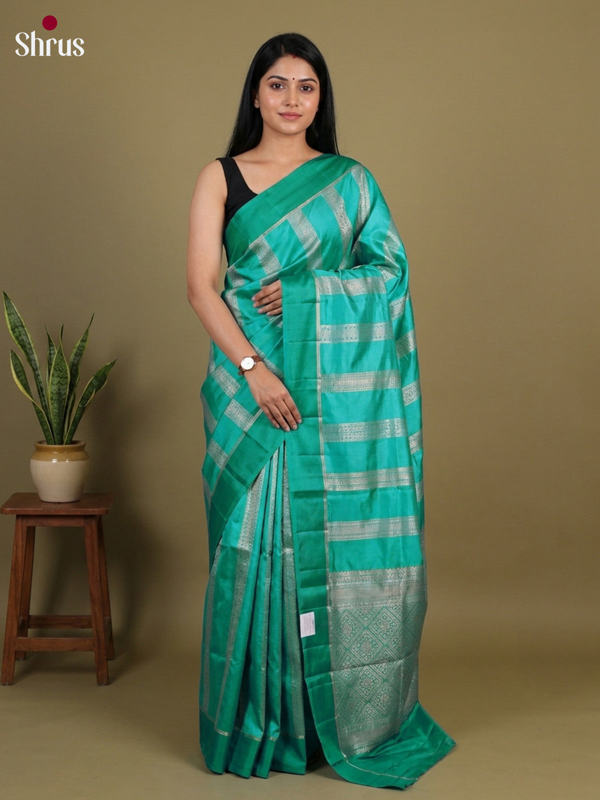 Elegant Green Apoorva Silk Saree with zari stripes & brocade pallu
