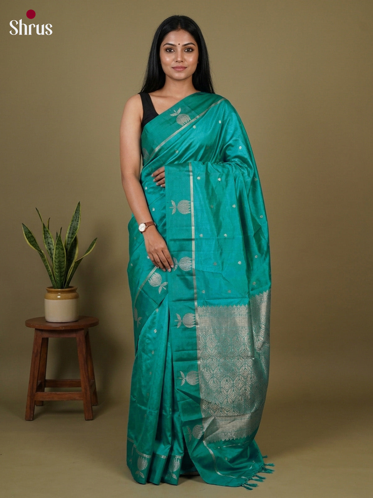 Pretty  Green  Apoorva Silk Saree  with zari buttas & brocade pallu