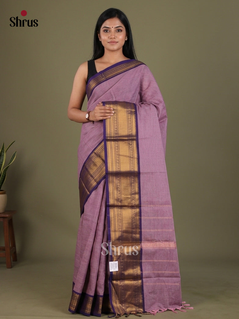 Enchanting Lilac Chettinad Cotton Saree With Plain Body & indigo Broad Zari Border