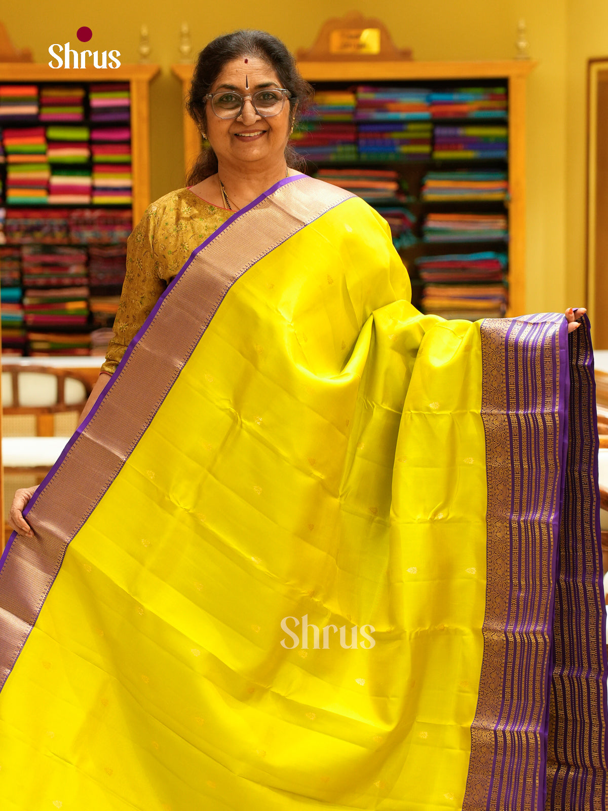 Exquisite Lime Yellow Kanchipuram Pattu Saree With Golden Buttas | Purple Zari Striped Border & Brocade Pallu