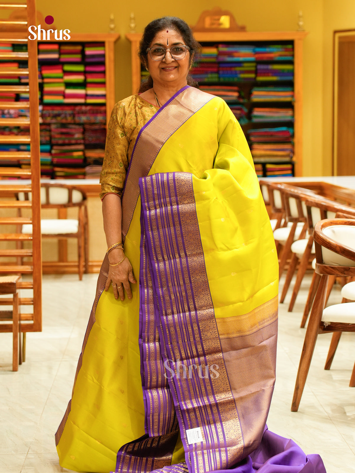Exquisite Lime Yellow Kanchipuram silk Saree With Golden Buttas | Purple Zari Striped Border & Brocade Pallu
