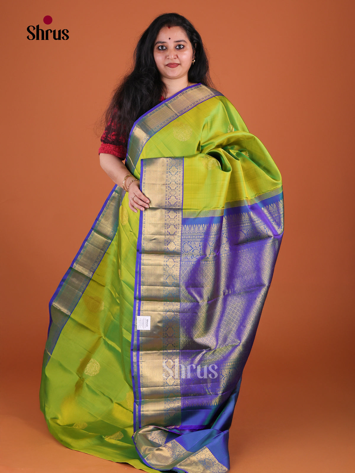 Exquisite Parrot Green Kanchipuram Silk Saree With Leaf Motifs | Royal Blue Zari Woven Border & Pallu