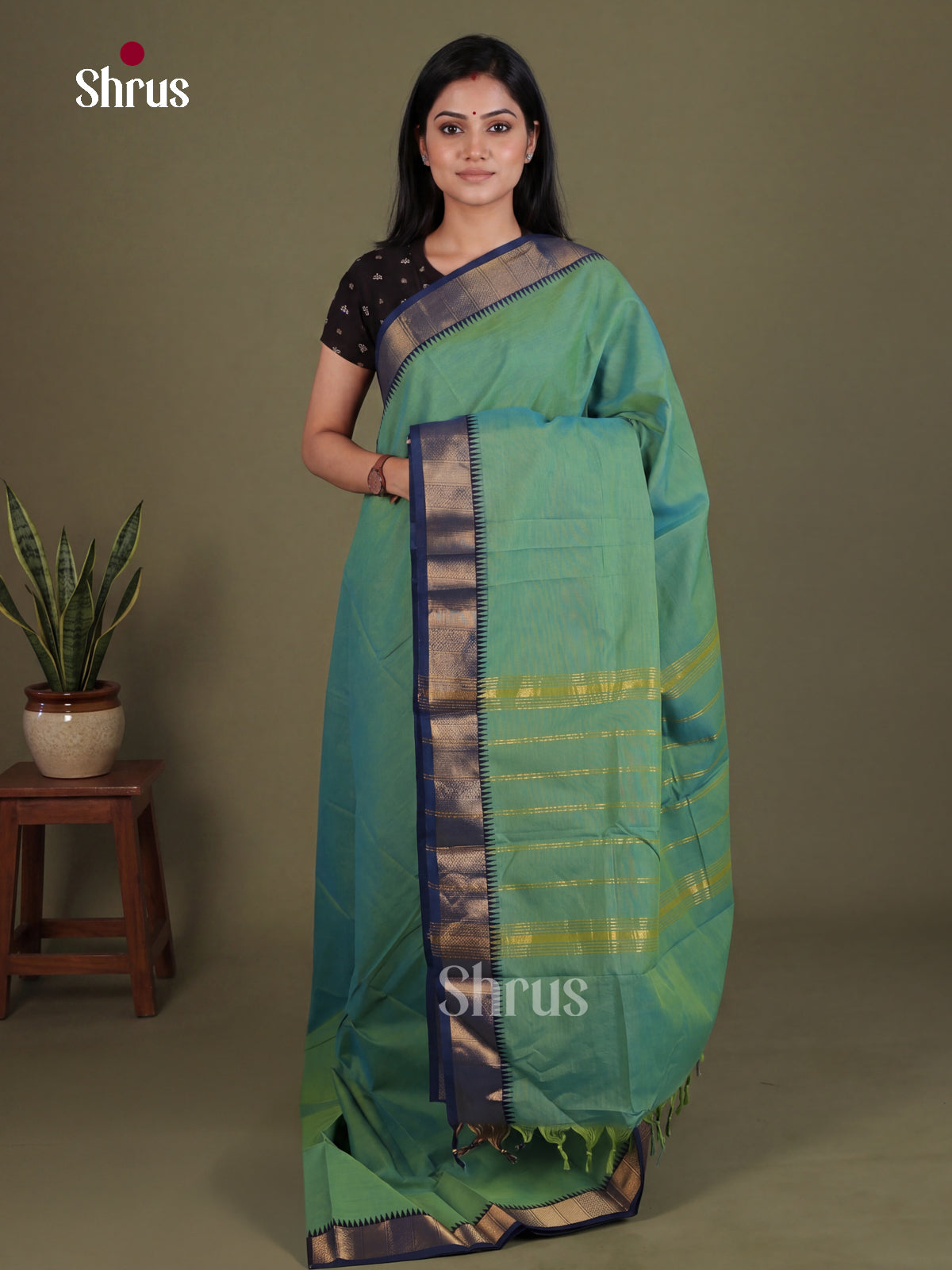 Exquisite Sea Green Chettinad Cotton Saree With Small Navy Border & Zari Striped pallu