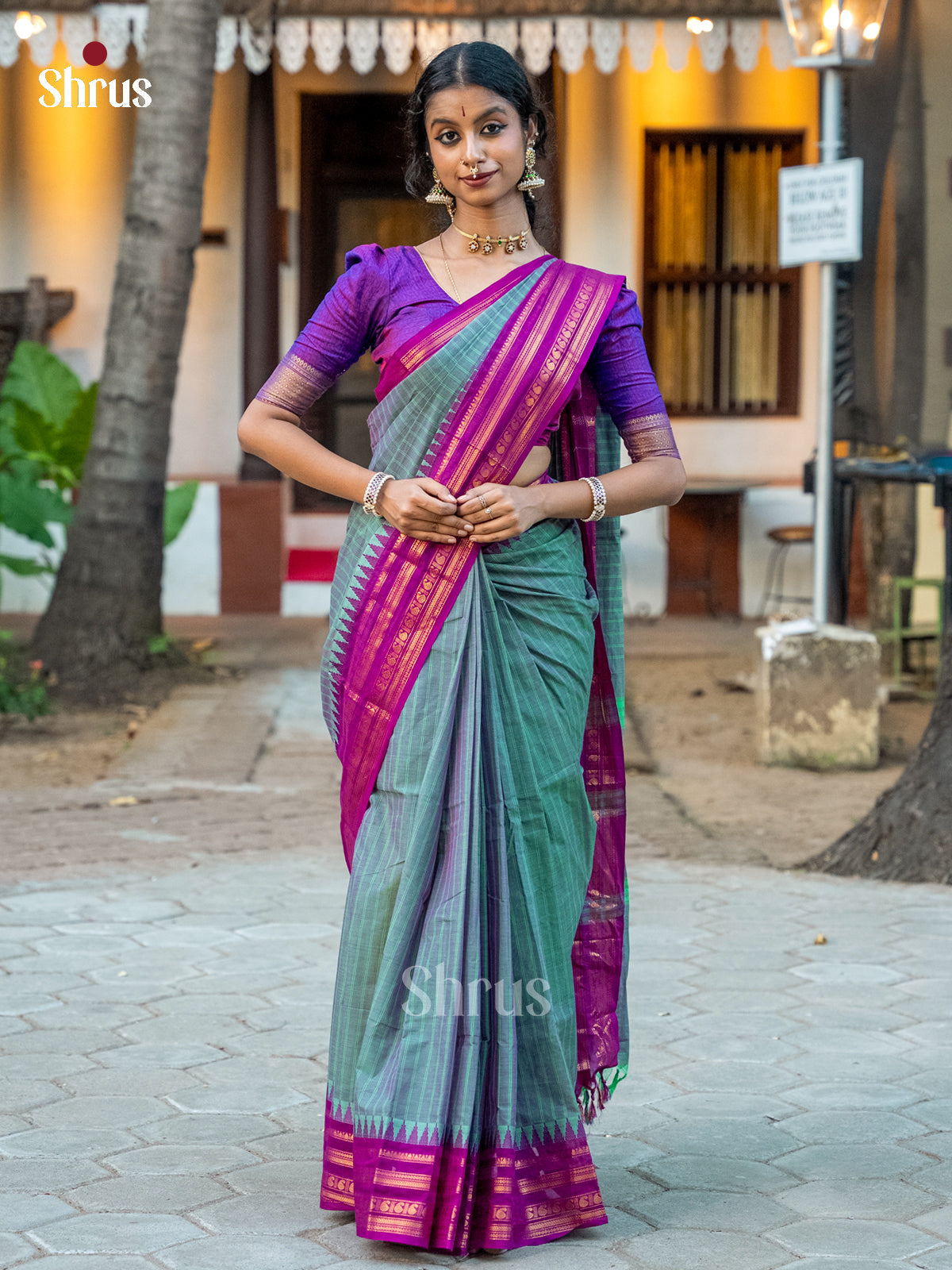 Graceful Dual Tone Green Chettinad Cotton Saree With Stripes & Purple Temple Zari Border - Shop on Shrus.com