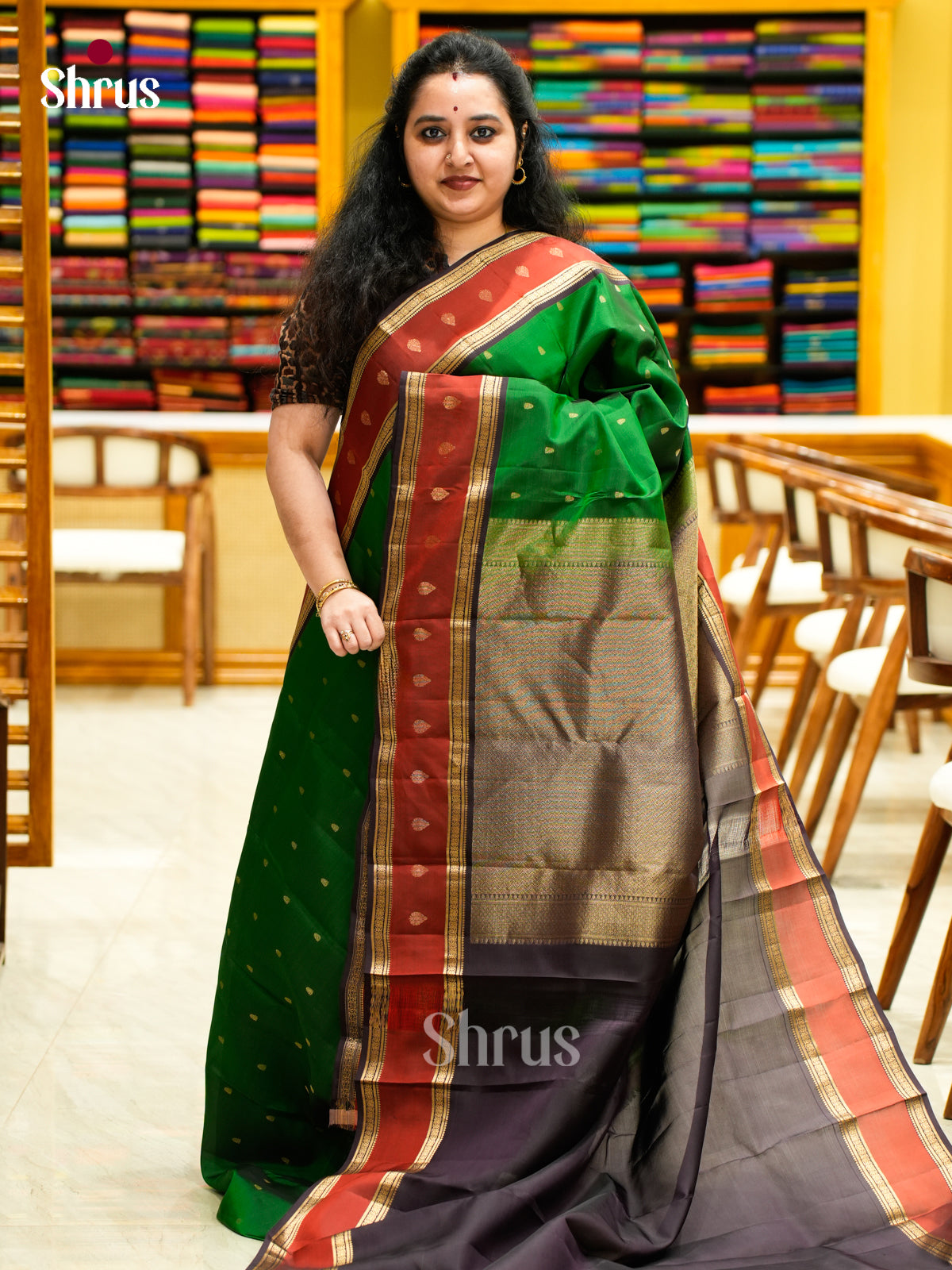 Elegant Green HalfPure Kanchipuram Saree With Leaf Buttas & Dark Purple Zari Woven Pallu
