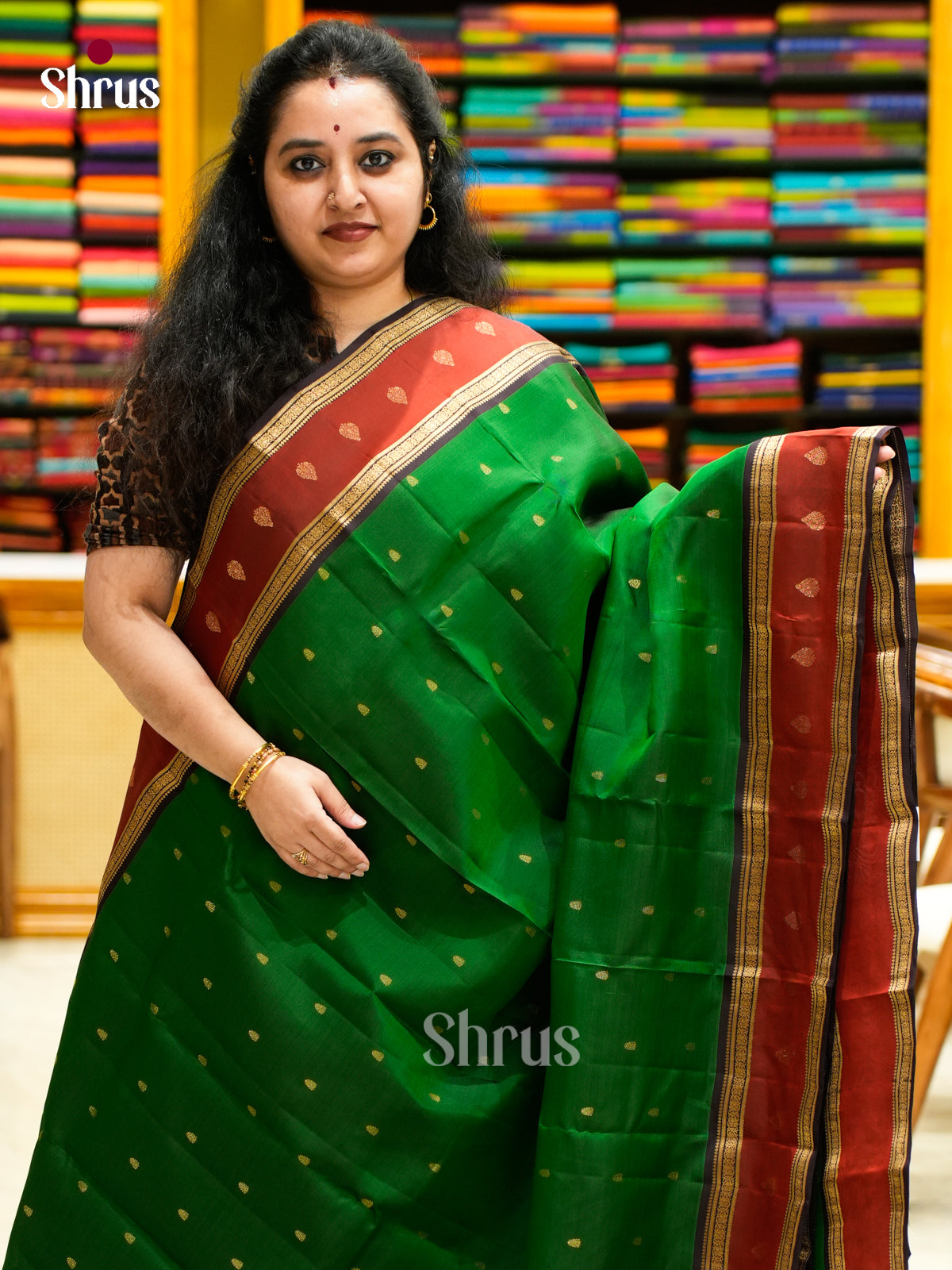 Elegant Green HalfPure Kanchipuram Sarees With Leaf Buttas & Dark Purple Zari Woven Pallu