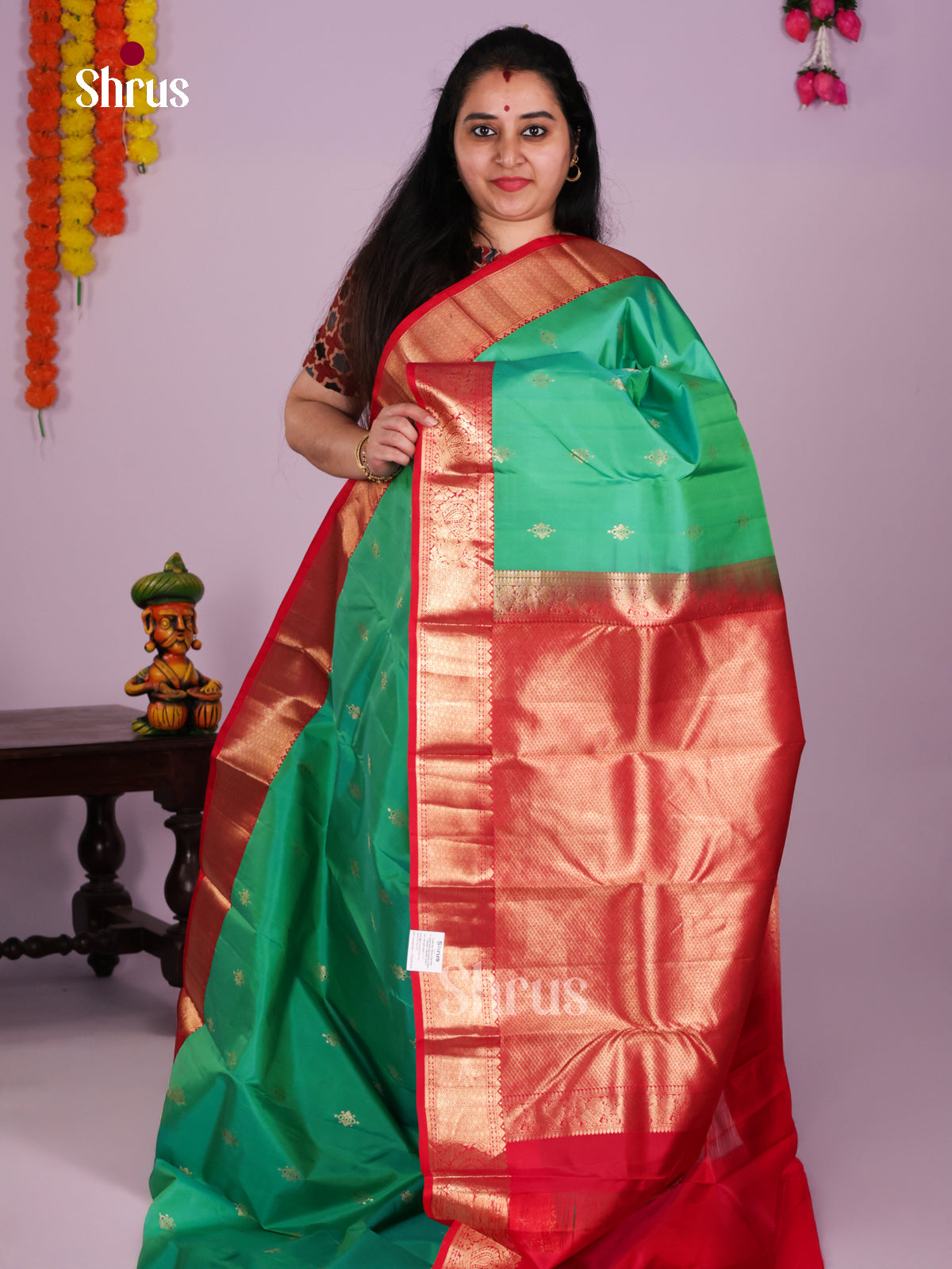 Buy Serene Green Kanchipuram Silk Saree with Golden Floral Buttas, Red Zari Border & Brocade Pallu