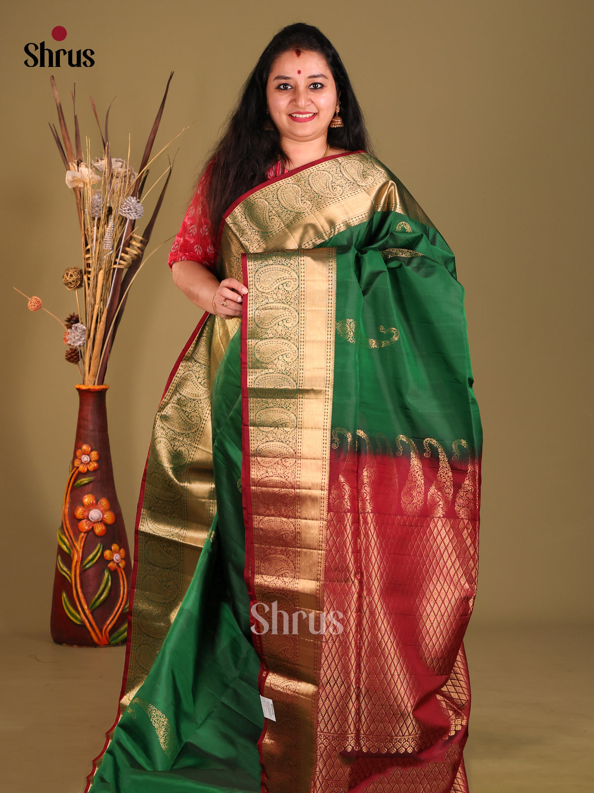 Elegant Green Soft Silk Saree With Paisley Motifs & Maroon Brocade Pallu