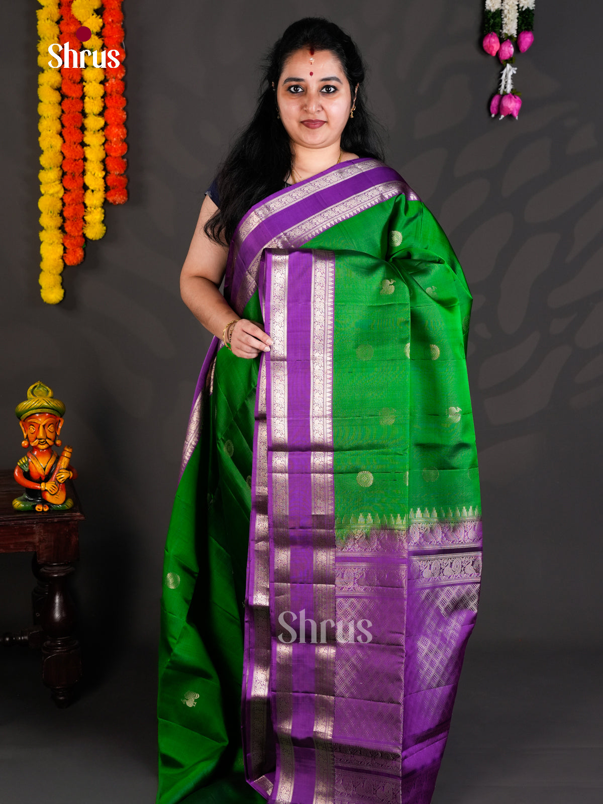 Buy Classy Green Soft Silk Saree with Peacock & Floral Buttas And Purple Rettaipet Border