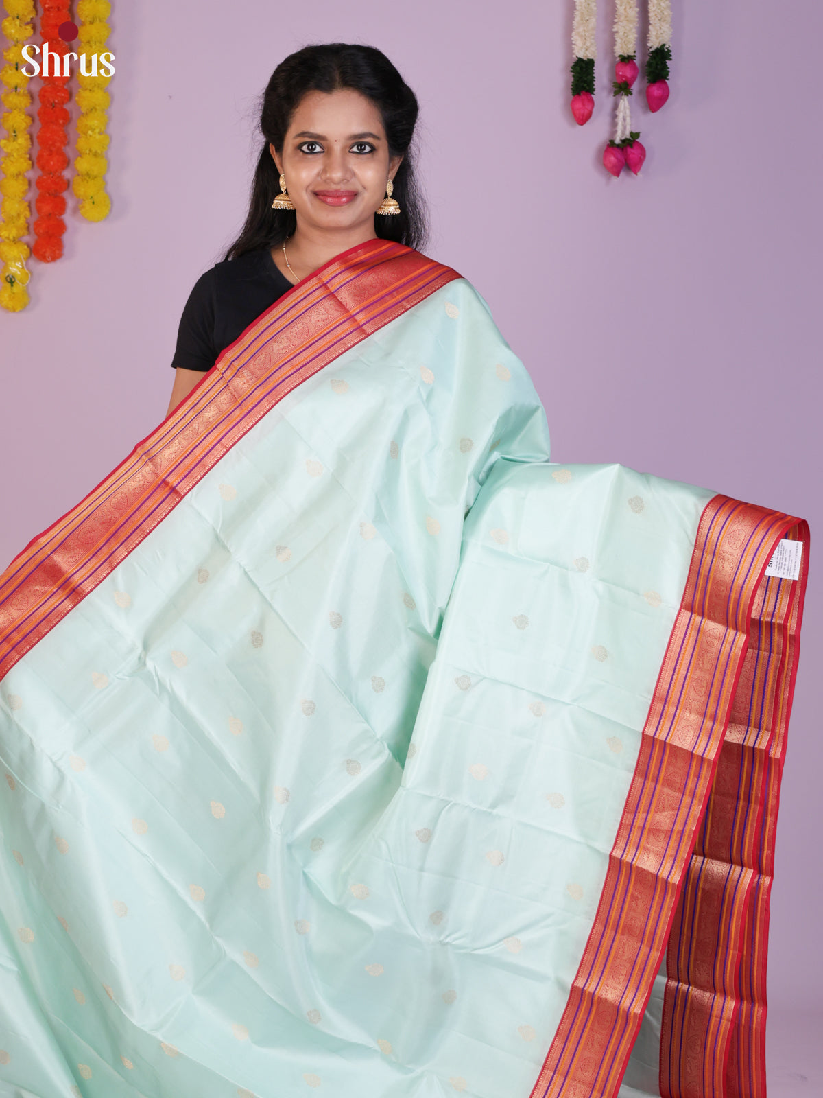 Buy Enchanting Ice Blue Kanchipuram Saree Gold Buttis, Pink Zari Striped Border & Brocade Pallu
