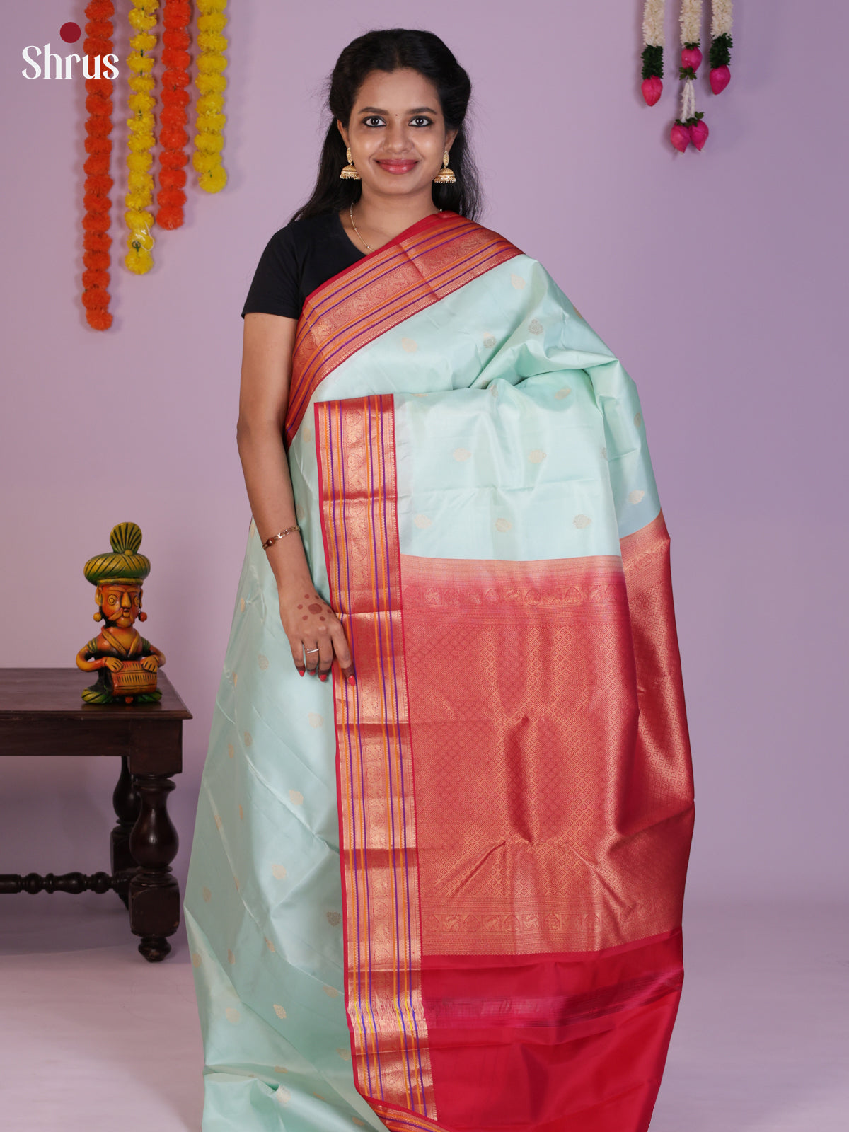 Buy Enchanting Ice Blue Kanchipuram Silk Saree Gold Buttis, Pink Zari Striped Border & Brocade Pallu