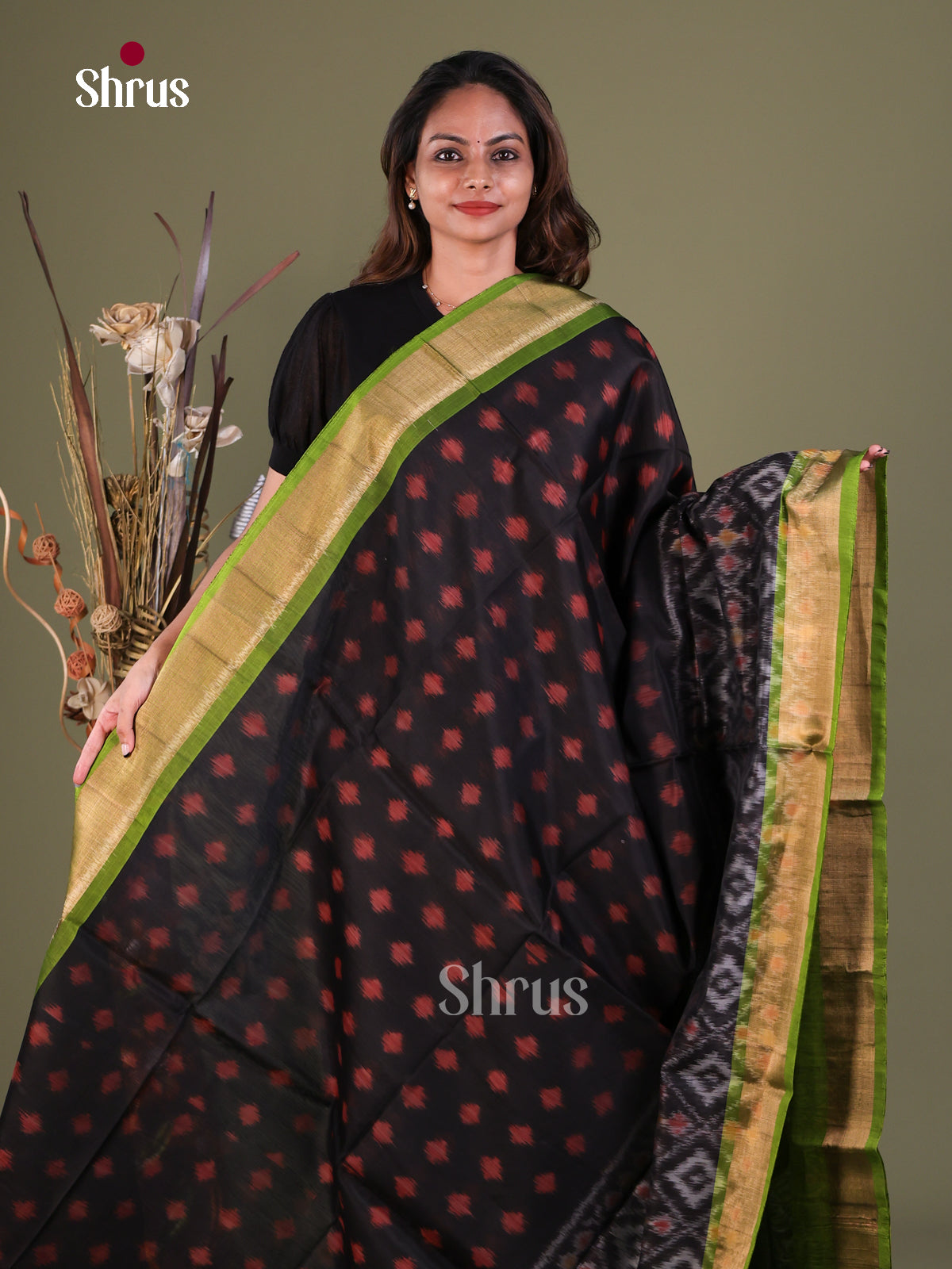 Lustrous Black Pochampally Cotton Silk Saree With Ikat Prints & Olive Green Zari Border
