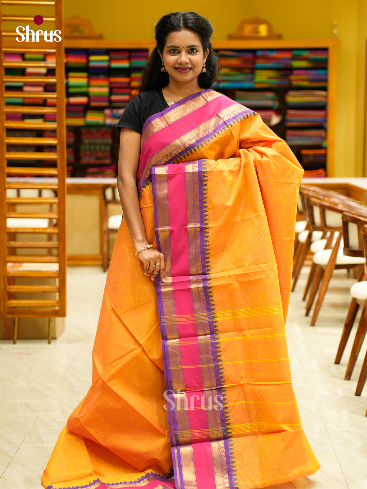 Lustrous Orange Chettinad Cotton Saree With Purple Rettapet Zari Border