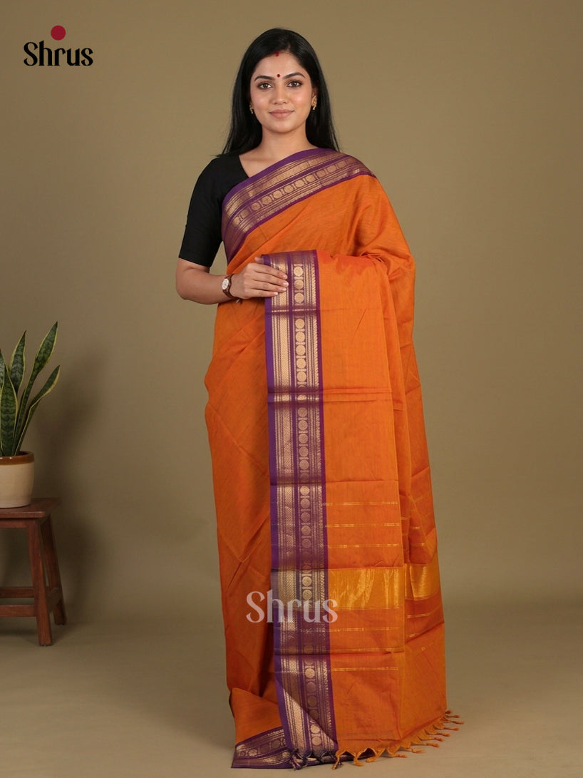 Luxurious Orange Chettinad Cotton Saree With Plain Body & Violet Border With Zari Bands