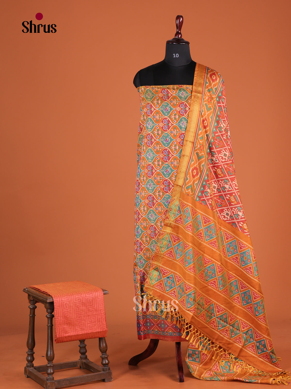 Orange Semi patola unstitch salwar with floral pattern