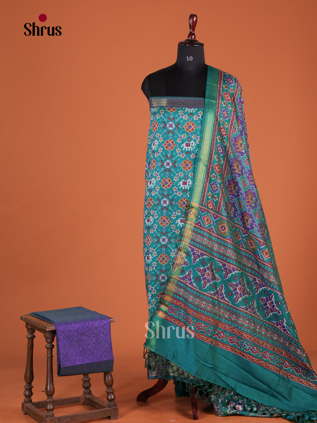 Pretty Teal & Purple Semi patola unstitch salwar with floral pattern