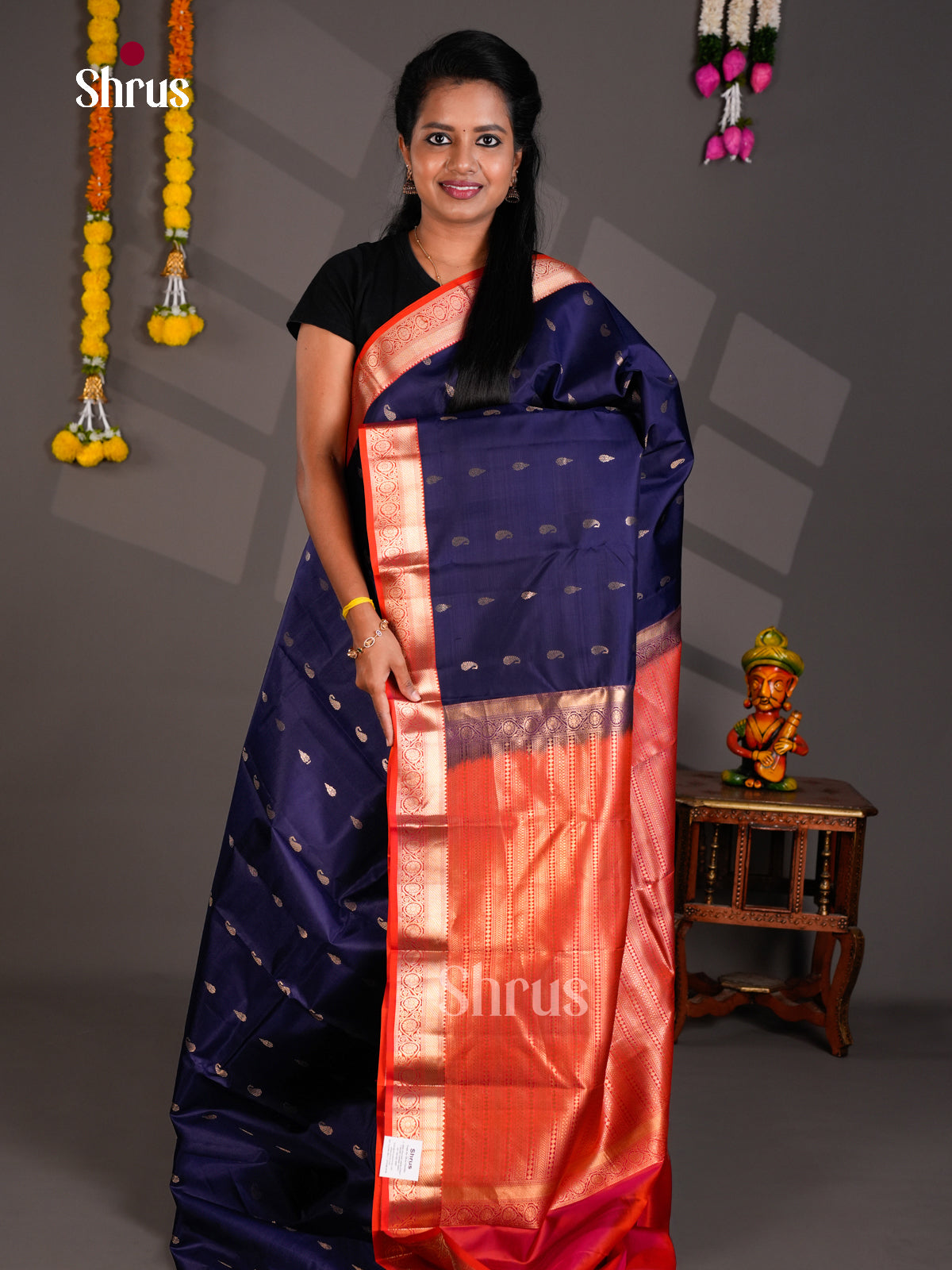 Buy Regal Navy Blue Kanchipuram Silk Saree with Manga Buttas, Orange Zari Border & Brocade Pallu