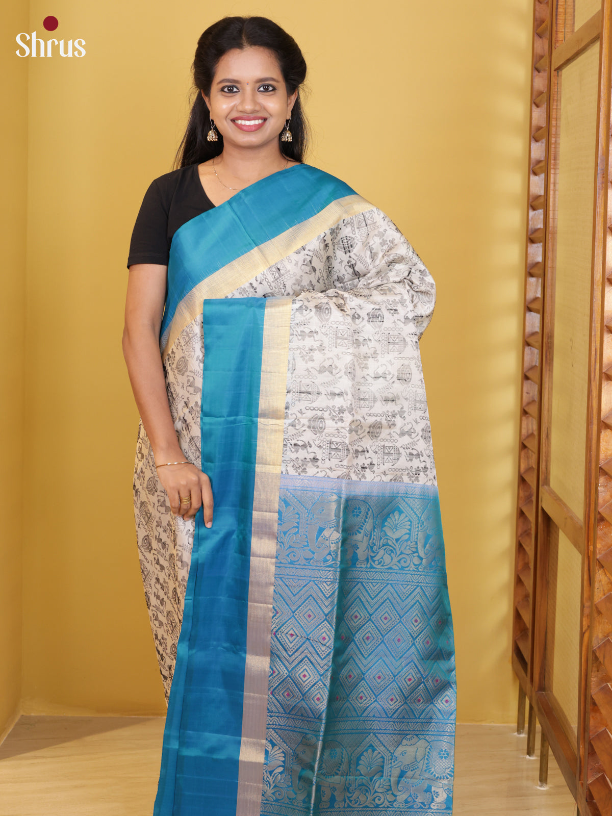 Buy Contemporary Off White Soft Silk Saree With Warli Inspired Prints, Blue Border & Brocade Pallu