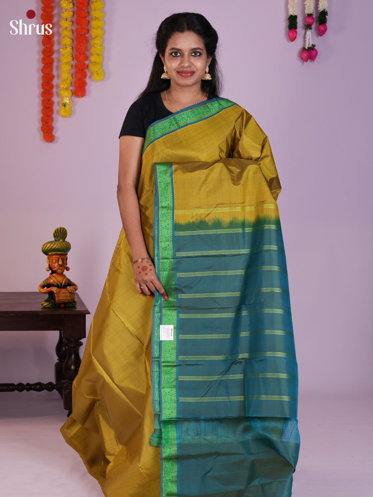 Buy Adorable Olive Green Kanchipuram Silk Saree With Green Metallic Border & Teal Chit Pallu